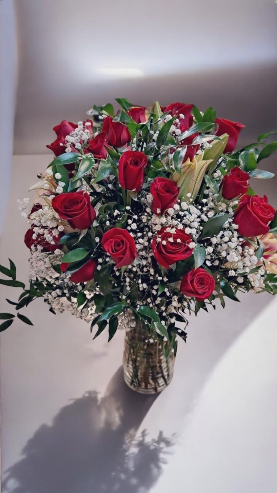 Pure Romance Pure Romance - Red roses, oriental lilies in vase