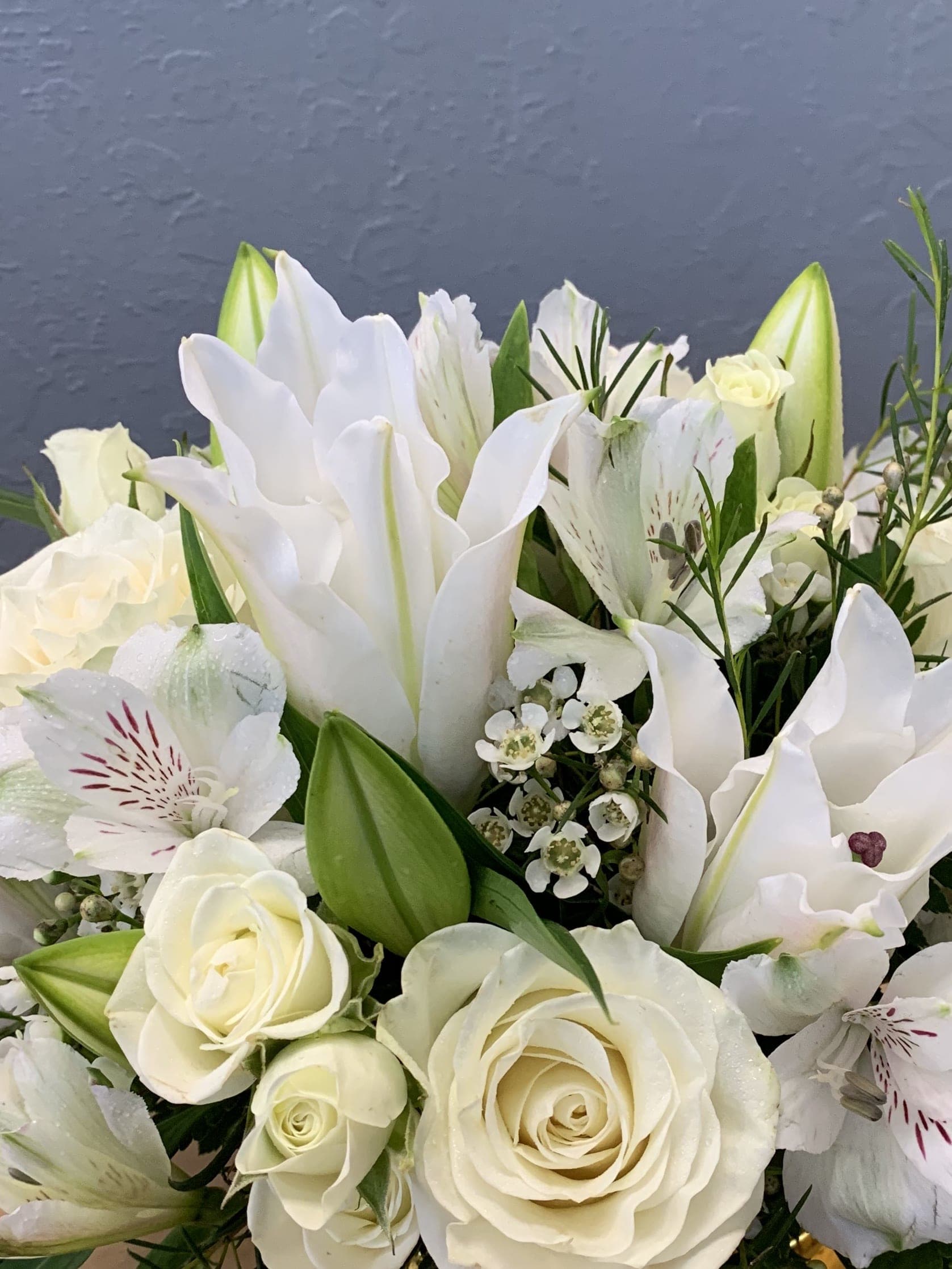 Deal Of The Day - All White - With our Deal of the Day bouquets, you pick your price and our expert florists exercise their creativity to design a beautiful bouquet using the freshest seasonal flowers available. Please note that flowers and designs will vary as our artisan florists work with the freshest, in-season flowers and their own personal inspiration - but you can be sure your bouquet will delight!