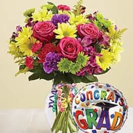 Congrats Grad Bouquet - Celebrate their accomplishments by sending this beautiful bright bouquet and festive graduation mylar balloon.
