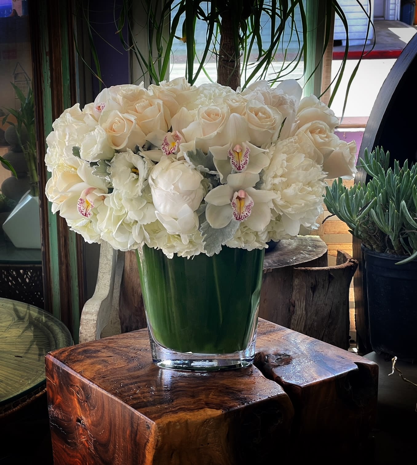 White Royal  - White Roses, Calla Lilies, Hydrangea, more elegant flowers ... in glass vase. 