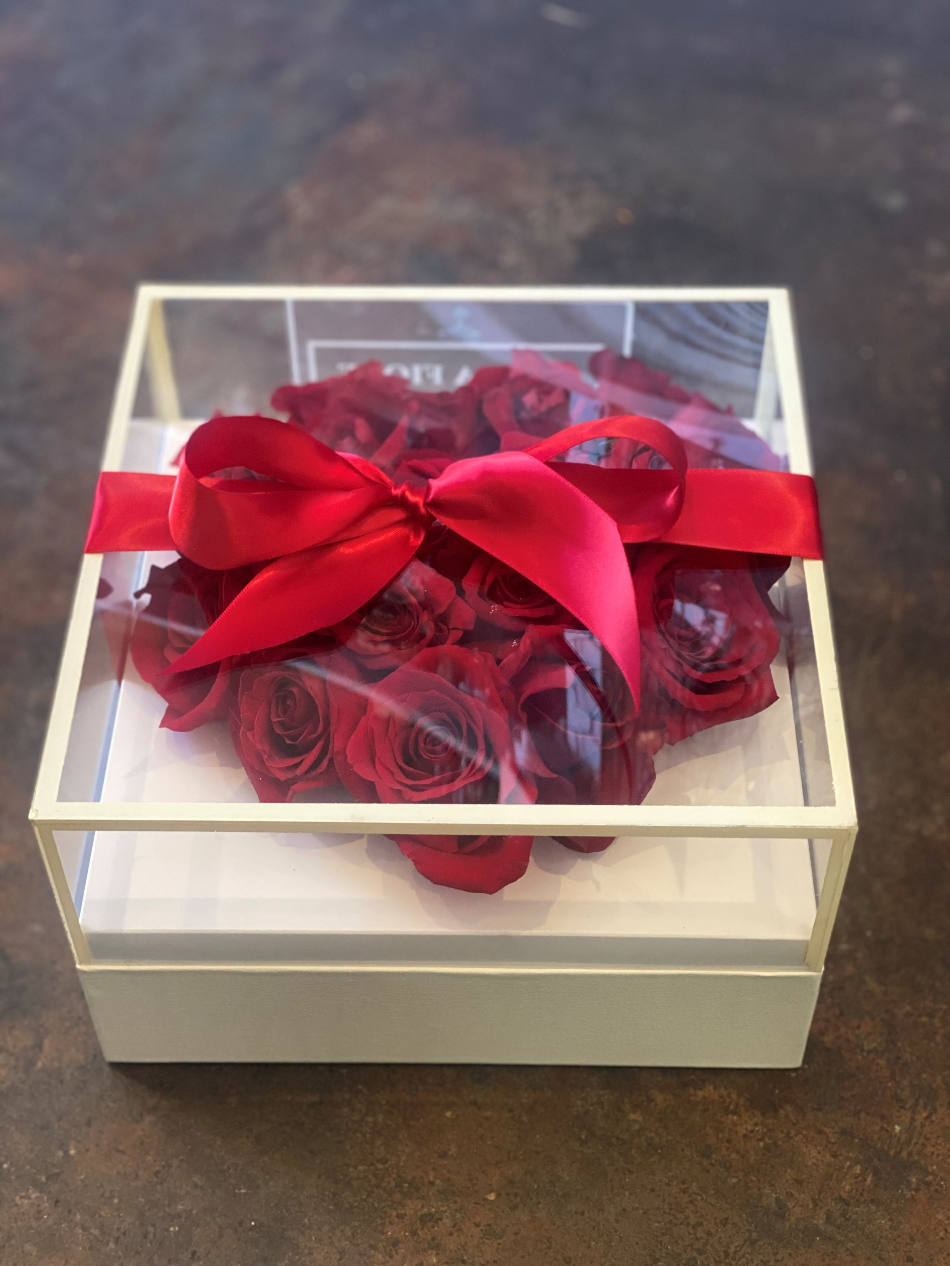 Forever my Heart  - Red roses in the shape of a Heart enclosed in a classy clear box special and unique design to make your loved one day more special. 