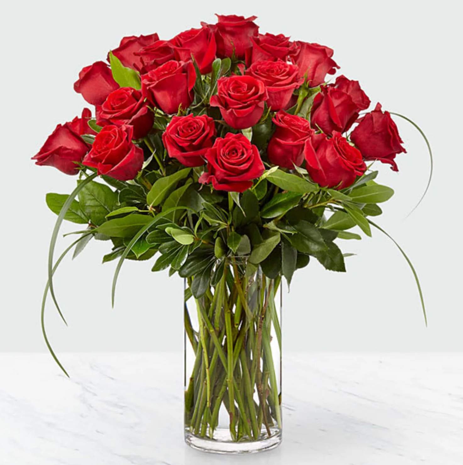 Everlasting Love 24 Rose Bouquet (FTD) - Nothing says “I love you″ more than the deep passion found within red roses. A heartfelt collection of red blooms sits among an array of assorted green placed in a simply modern glass cylindrical vase perfect to deliver a special message. 24 red roses
