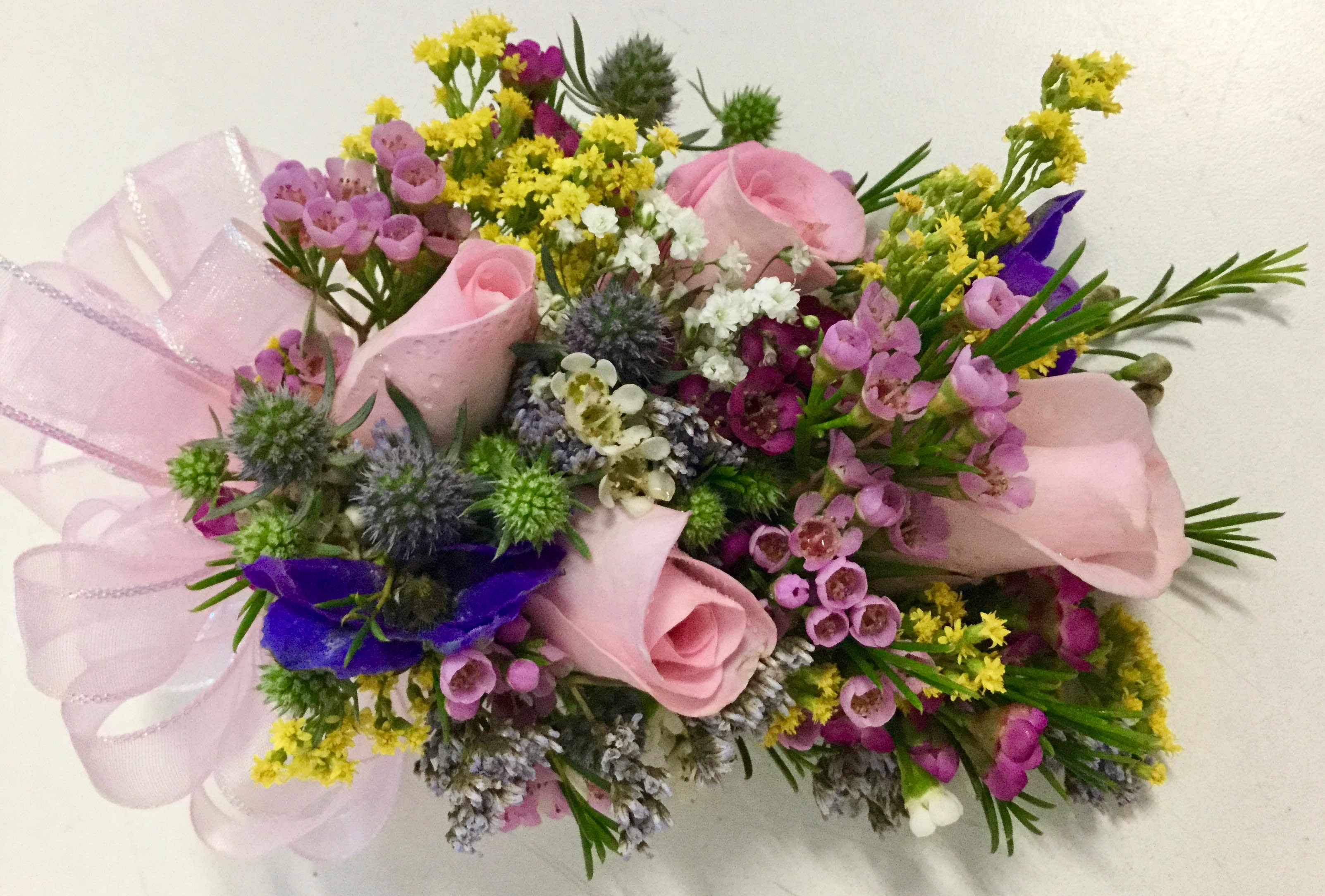 Spring corsage Spring corsage - pink roses and miniature colorful flowers