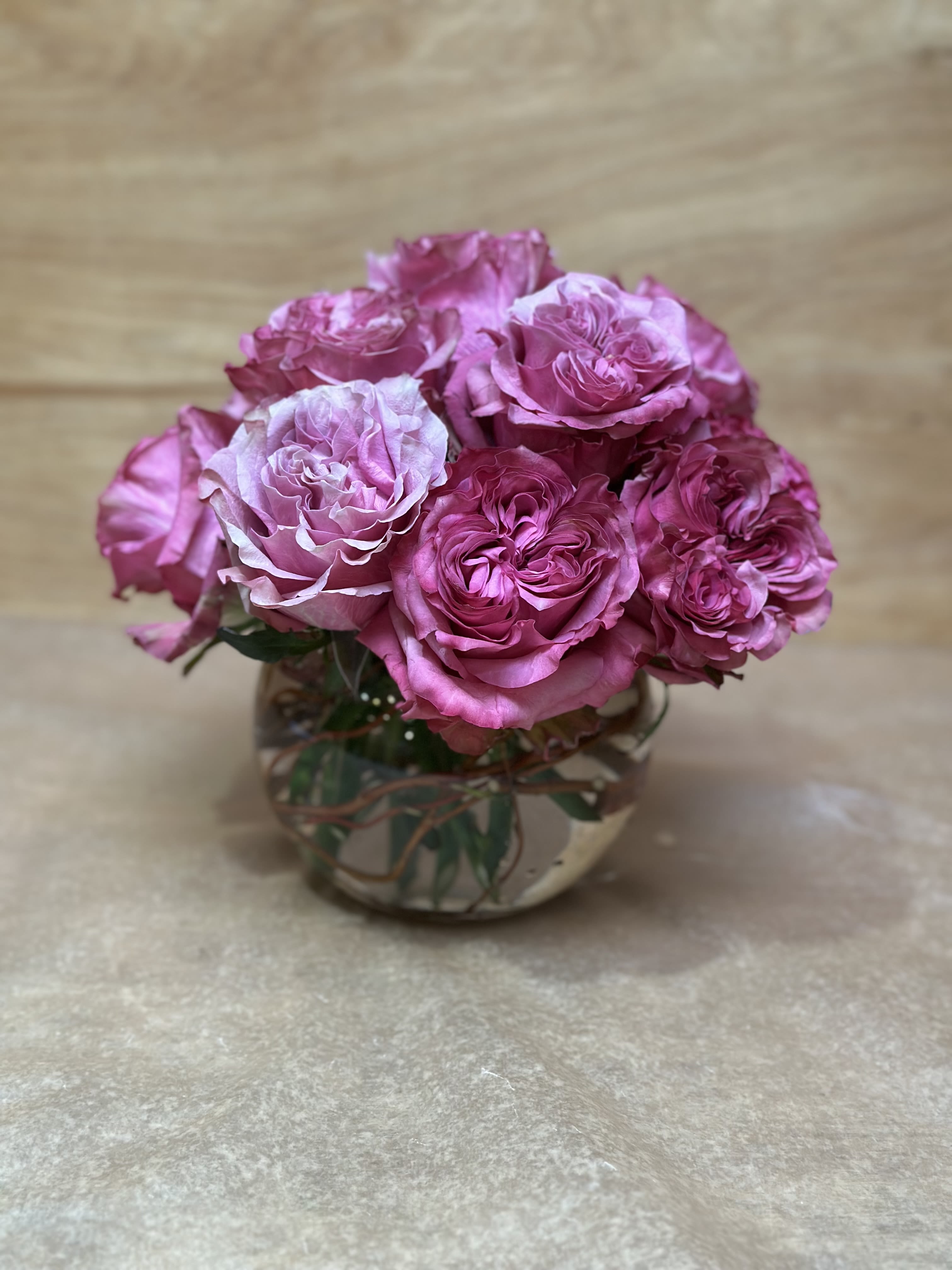 Pink Romance - 12 deep pink cabbage roses exquisitely arranged in a 6&quot; bubble bowl.. Height: Approximately 10&quot;