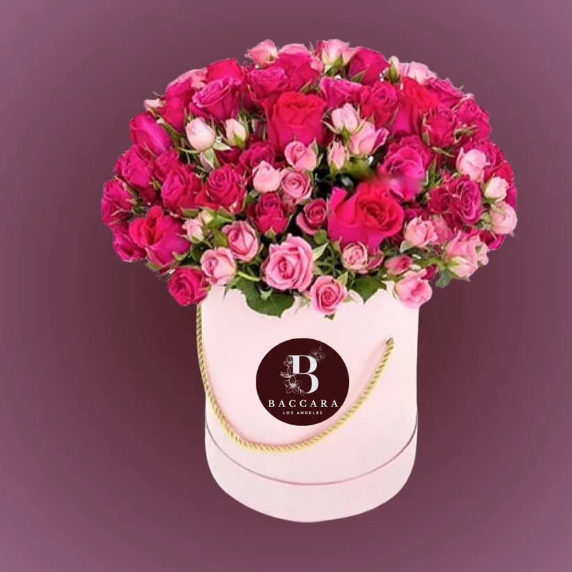 Blush Elegance: Pink Rose Box Blush Elegance: Pink Rose Box - Delight in the timeless beauty of our Blush Elegance Pink Rose Box, featuring a harmonious blend of dark pink roses and light pink baby roses. This exquisite arrangement exudes grace and sophistication, making it an ideal gift for expressing love, celebrating special occasions, or simply brightening someone's day. Disclaimer: Product images are for reference only. Actual flower shades, box colors, and arrangement styles may vary slightly based on seasonal availability and stock. We always strive to match the overall style, color palette, and quality shown in the photos, ensuring every arrangement is fresh, beautiful, and thoughtfully curated.