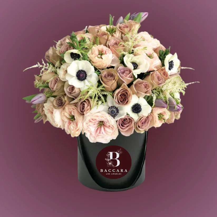 Luxury Mixed Bloom Box Luxury Mixed Bloom Box - Experience the epitome of elegance with our Luxury Mixed Bloom Box. This exquisite arrangement features a curated selection of premium, handpicked flowers, thoughtfully combined to create a harmonious blend of colors and textures. Perfect for celebrating special occasions or simply brightening someone's day, this luxurious box is a testament to refined taste and sophistication. Each bloom is selected for its freshness and beauty, ensuring a stunning presentation that leaves a lasting impression. Disclaimer: Product images are for reference only. Actual flower shades, box colors, and arrangement styles may vary slightly based on seasonal availability and stock. We always strive to match the overall style, color palette, and quality shown in the photos, ensuring every arrangement is fresh, beautiful, and thoughtfully curated.