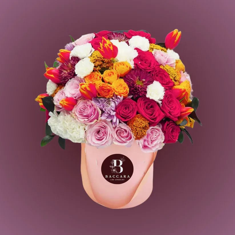Radiant Harmony: Multi-Color Flower Box Radiant Harmony: Multi-Color Flower Box - Experience a vibrant celebration of colors with our Radiant Harmony Flower Box. This exquisite arrangement features a curated selection of premium, handpicked flowers in a harmonious blend of hues, creating a stunning visual symphony. Perfect for brightening any occasion, this luxurious box embodies joy, elegance, and sophistication. Disclaimer: Product images are for reference only. Actual flower shades, box colors, and arrangement styles may vary slightly based on seasonal availability and stock. We always strive to match the overall style, color palette, and quality shown in the photos, ensuring every arrangement is fresh, beautiful, and thoughtfully curated.