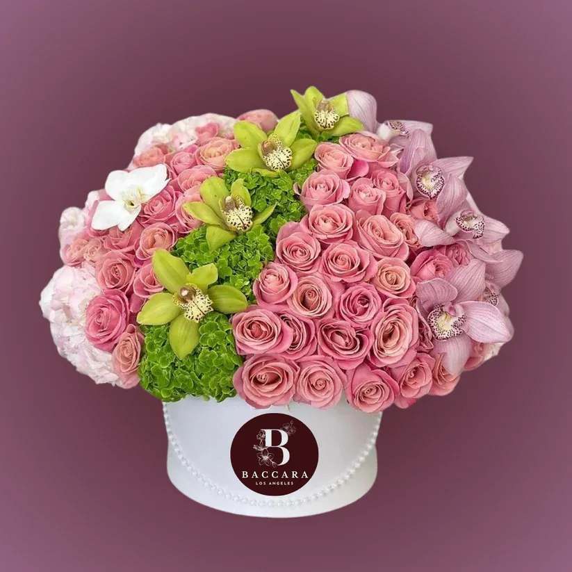 The Luxe Bloom Box: Handpicked Luxury Flowers The Luxe Bloom Box: Handpicked Luxury Flowers - Indulge in floral elegance with our Luxe Bloom Box — a stunning arrangement of handpicked, premium flowers beautifully presented in a sophisticated luxury box. Designed to celebrate life’s most cherished moments, this breathtaking arrangement is perfect for anniversaries, birthdays, romantic gestures, or luxurious surprises. Each flower is carefully selected for its flawless beauty, rich color, and lasting freshness, thoughtfully styled into an elegant box that makes a showstopping statement. Highlights: Luxury handpicked flowers, curated for beauty and freshness Presented in an elegant signature box for a premium finish Ideal for milestone celebrations, heartfelt gifts, and luxury decor Create a moment of pure luxury with a floral arrangement designed to captivate and impress. Disclaimer: Product images are for reference only. Actual flower shades, box colors, and arrangement styles may vary slightly based on seasonal availability and stock. We always strive to match the overall style, color palette, and quality shown in the photos, ensuring every arrangement is fresh, beautiful, and thoughtfully curated.