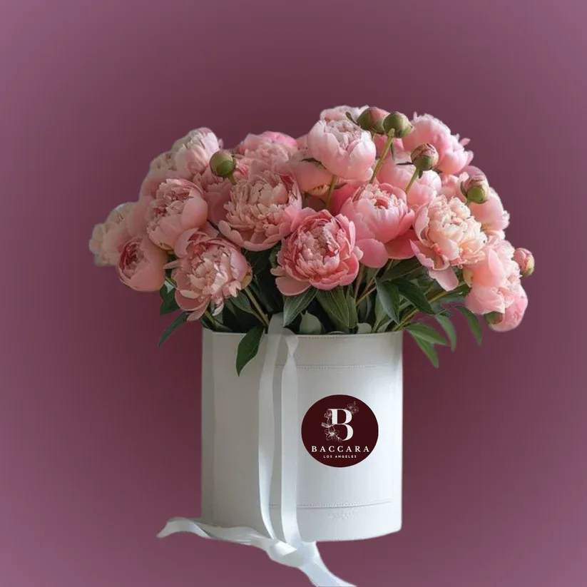 Peony Perfection: All-Pink Spring Floral Arrangement Peony Perfection: All-Pink Spring Floral Arrangement - Indulge in the beauty of spring with our Peony Perfection floral arrangement! Bursting with luxurious all-pink peonies, this stunning display captures the essence of elegance and romance. Each bloom is a testament to spring's freshness, arranged artfully to create a lush, vibrant centerpiece. Perfect for special occasions or simply to brighten your day, this arrangement brings a touch of sophistication and joy to any space. Celebrate the season of renewal with the enchanting charm of these exquisite peonies! Disclaimer: Product images are for reference only. Actual flower shades, box colors, and arrangement styles may vary slightly based on seasonal availability and stock. We always strive to match the overall style, color palette, and quality shown in the photos, ensuring every arrangement is fresh, beautiful, and thoughtfully curated.