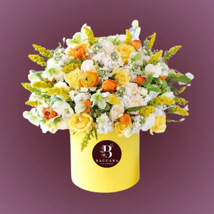 Sunny Summer Bliss: Yellow Flower Arrangement Sunny Summer Bliss: Yellow Flower Arrangement - Embrace the warmth of summer with our vibrant yellow flower arrangement! Bursting with cheerful sunflowers, delicate daisies, and lush greenery, this stunning display captures the essence of sunny days and joyful moments. Perfect for brightening up your home or as a delightful gift for someone special, this arrangement brings a touch of sunshine to any occasion. Elevate your space with the fresh and uplifting vibes of summer! Disclaimer: Product images are for reference only. Actual flower shades, box colors, and arrangement styles may vary slightly based on seasonal availability and stock. We always strive to match the overall style, color palette, and quality shown in the photos, ensuring every arrangement is fresh, beautiful, and thoughtfully curated.