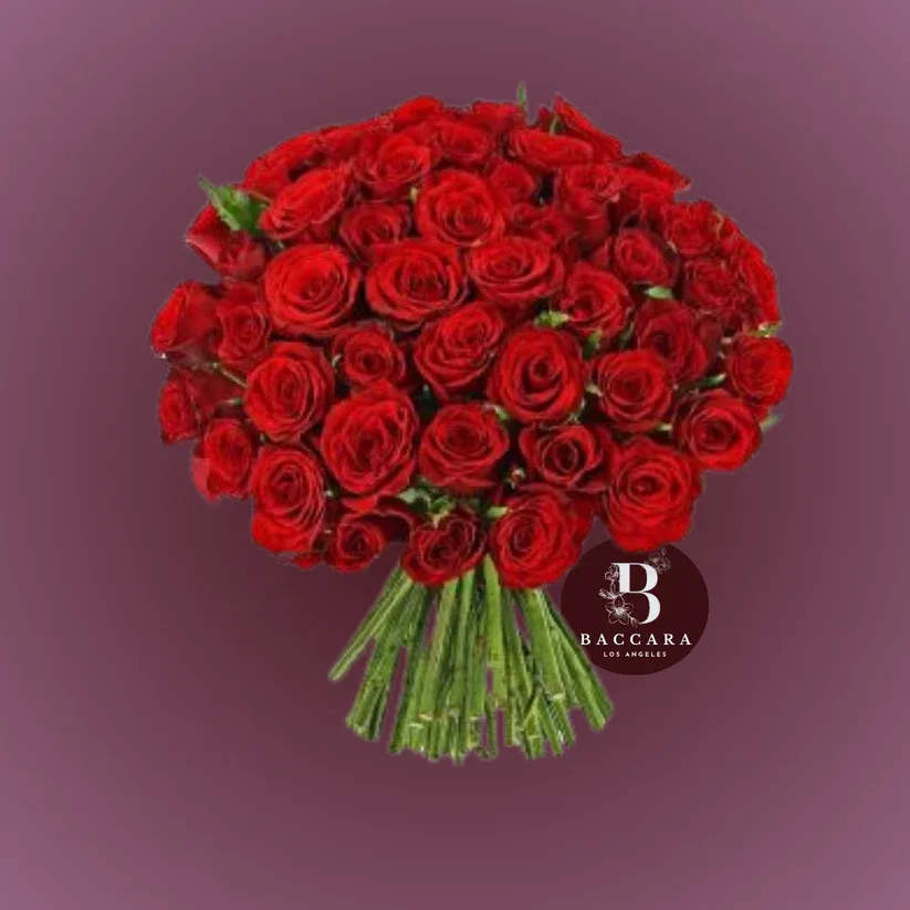 Scarlet Embrace: Red Hand-Tied Roses Scarlet Embrace: Red Hand-Tied Roses - Drape your emotions in the timeless beauty of our Scarlet Embrace Bouquet, featuring hand-tied red roses in the quantity of your choice. A symbol of deep love, passion, and devotion, this breathtaking arrangement is the ultimate romantic gesture for anniversaries, proposals, or simply to say “I love you” in the most unforgettable way. Each rose is carefully selected for its rich, velvety petals and vibrant crimson hue, hand-tied into an elegant, full-bodied bouquet that makes a bold, heartfelt statement. Highlights: Premium, farm-fresh red roses — select your preferred quantity Expertly hand-tied for a natural, elegant look Perfect for romantic milestones, anniversaries, or declarations of love Customizable with luxurious wrapping and a personal message Express your heart’s deepest emotions with the unmatched beauty of classic red roses — choose the perfect number to match your message.