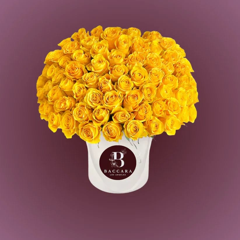 Golden Glow: Yellow Rose Box Golden Glow: Yellow Rose Box - Radiating happiness, warmth, and positivity, our Golden Glow Rose Box is a vibrant arrangement of handpicked yellow roses. Symbolizing friendship, joy, and new beginnings, this cheerful rose box makes the perfect gift for birthdays, celebrations, thank-you gestures, or simply to brighten someone’s day. Choose your desired size — from a sweet, thoughtful box to a generous, show-stopping arrangement. Each rose is carefully selected for its rich golden hue and velvety petals, beautifully arranged in a modern, elegant box that adds a fresh burst of sunshine to any space. Highlights: Premium, farm-fresh yellow roses beautifully arranged in a chic box Available in multiple sizes — select the one that fits your moment best Ideal for celebrations, friendship, and uplifting surprises Optional message card and luxury wrapping available Send sunshine and joy with the timeless charm of yellow roses, perfectly presented in a luxe flower box. Disclaimer: Product images are for reference only. Actual flower shades, box colors, and arrangement styles may vary slightly based on seasonal availability and stock. We always strive to match the overall style, color palette, and quality shown in the photos, ensuring every arrangement is fresh, beautiful, and thoughtfully curated.