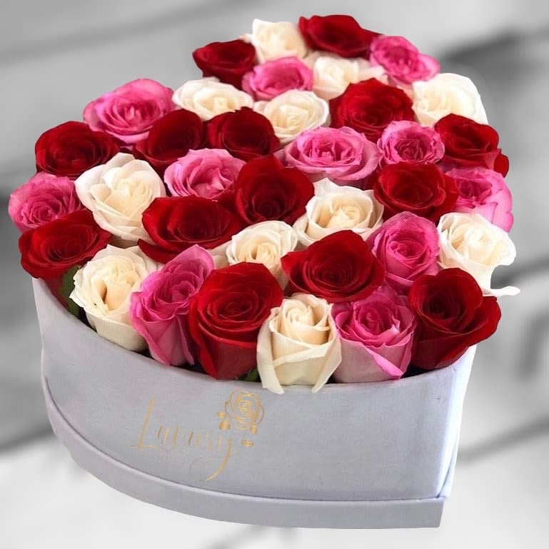Sweet Heart Box - These fancy sweetheart boxes make it perfect to show how much you love that special person in your life. Roses in Box: 30-36 stems of natural roses. Color Box: White or Black (subject to inventory availability) All Occasion Place your Order Online Monday to Saturday before 1:00 p.m. (E.T.) for same-day delivery.  “Orders received after hours will be delivered the next business day”. Check our coverage area. Occasionally, flowers and/or containers are substituted due to weather, seasonality, and market conditions, which may affect availability. If this is the case with the gift you’ve selected, we will ensure that your arrangement's style, theme, and color scheme are preserved and will only substitute items of equal value or higher value.  CARE INSTRUCTIONS Gently mist the arrangement with natural water every other day. Do not spray any cleaning product on the flower arrangement. Do not place heavy objects directly on the flower arrangement. Keep them out of direct sunlight and extreme heat.  