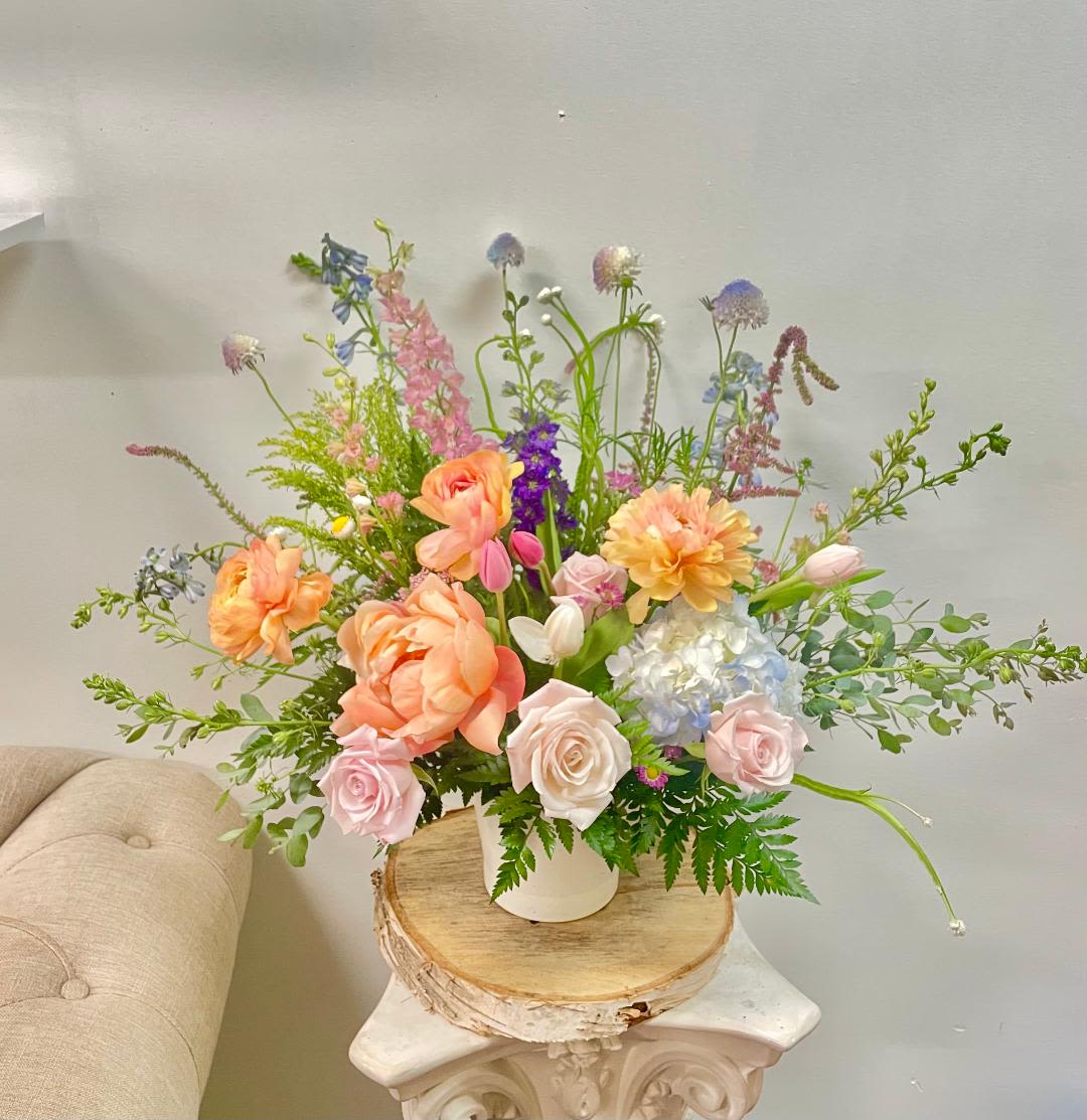 Lemon Garden - Product Information Theme Colors: Shades of Yellow and White  Featured Blooms: Scabious, Tulips, Roses, Delphinium, Hydrangeas, Ranunculus, Peonies&amp; Wild greens  HK Flowers have a uniqueness of florals and seasonal blooms, certain flowers or colors may not be available as each season affects the availability, color, size, and shape of each floral bloom. Some flowers may be substituted accordingly.  Photos are used as a reference for the color palette and is NOT indicated of the final product. We ask for your trust in us that we will pick out the best seasonal available blooms, while still capturing the arrangements' theme and colors mentioned above.