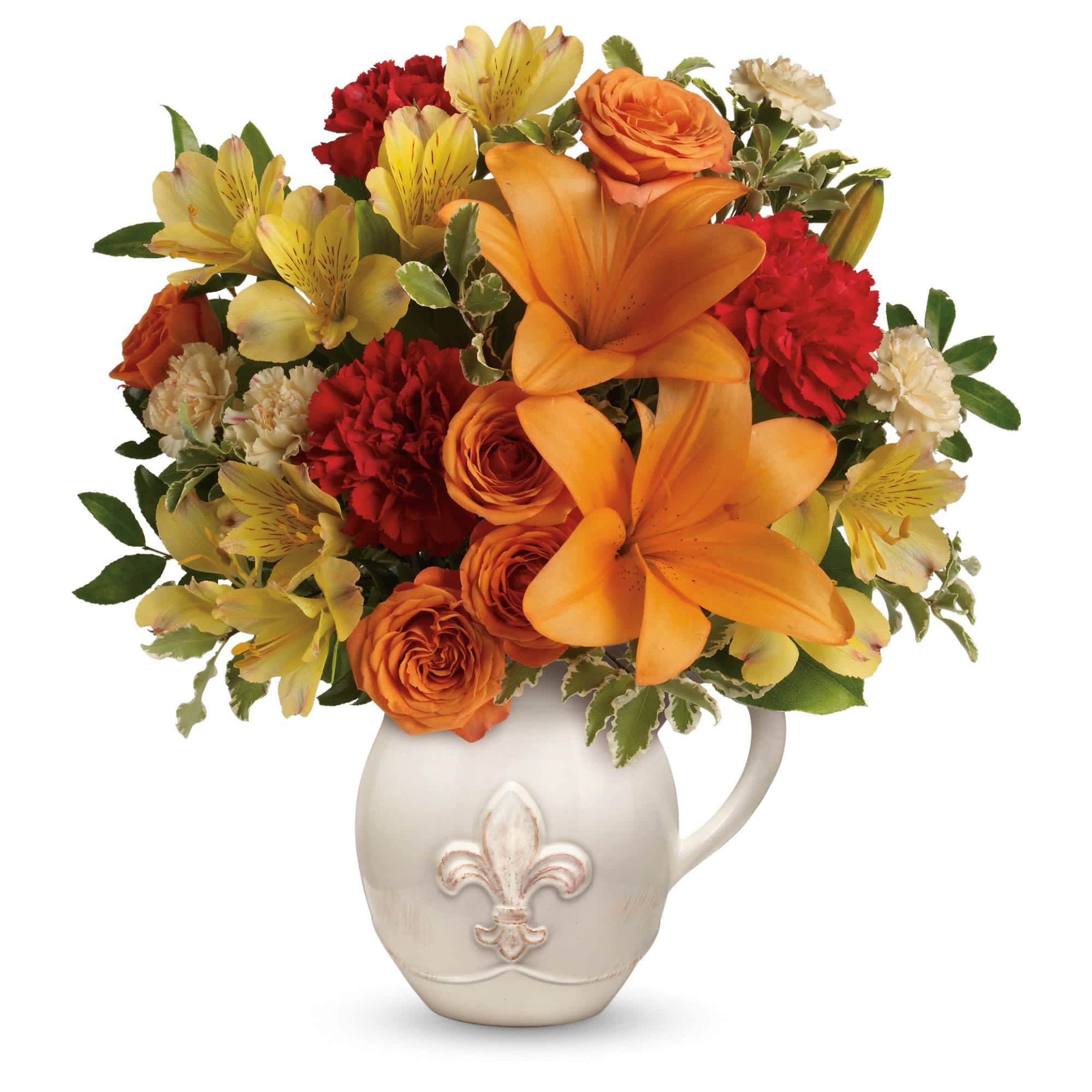 Teleflora's Summer Cottage - Capture the lovely warmth of summer with this gorgeous arrangement. Orange spray roses and asiatic lilies arrive in our charming French country ceramic pitcher.  
