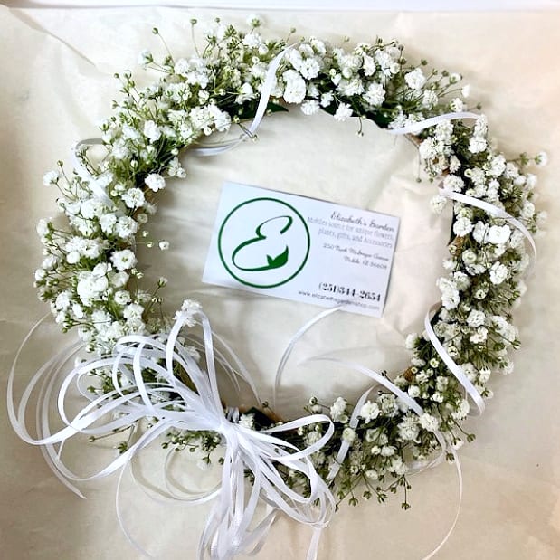 Floral Crown / Halo with Babies Breath - Embrace the beauty of nature with our Floral Crown or Halo, a delicate and timeless headpiece crafted with fresh natural foliage and baby’s breath. Perfect for confirmations, serving girls, proms, homecoming dances, recitals, and weddings, this intricately designed crown adds a touch of elegance and grace to your most cherished celebrations. Its exquisite craftsmanship and sophisticated design make it the perfect accessory to enhance your special day. LET US KNOW SIZE -Key Features: **Fresh Natural Foliage: A lush base of greenery creates a natural and organic look, perfectly blending with any outfit or theme. 18 to 22 inches in circumferences. **Baby’s Breath Accents: Tiny, delicate blooms add softness and an ethereal touch to the design, making it ideal for formal and semi-formal events. **Lightweight and Comfortable: Designed to be worn effortlessly throughout the day, ensuring comfort without compromising style. **Versatile Design: Suitable for a variety of events, from weddings to recitals, creating a timeless and elegant look. -Benefits: **Complements a wide range of hairstyles and outfits with a natural and graceful aesthetic. **Adds a whimsical and romantic touch to formal occasions. **Handcrafted with care to ensure quality and a fresh appearance. This floral crown is more than just an accessory—it’s a statement piece that exudes effortless beauty and sophistication. Order yours today to complete your look and make your celebration truly unforgettable!