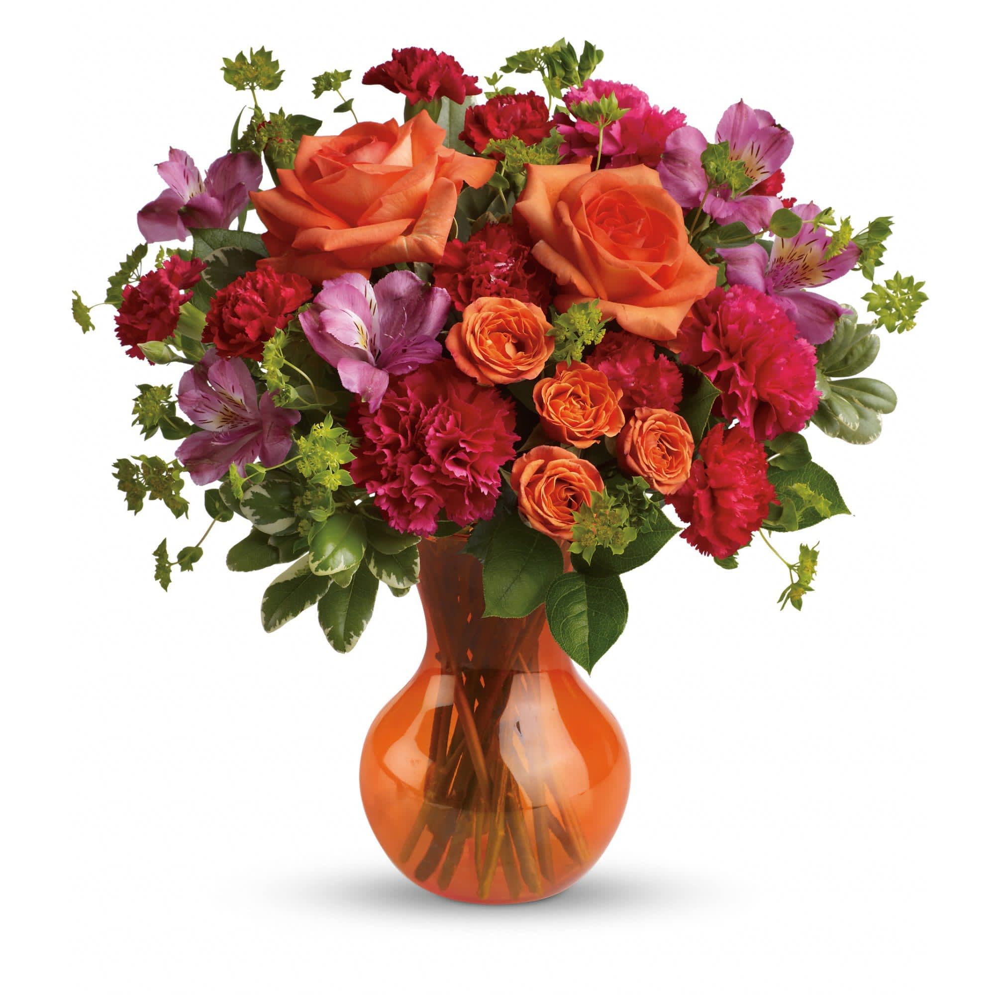 Teleflora's Fancy Free Bouquet - At once bold and delicate, this gorgeous gathering of pink and orange blooms is a fabulous way to fancy up her day.  