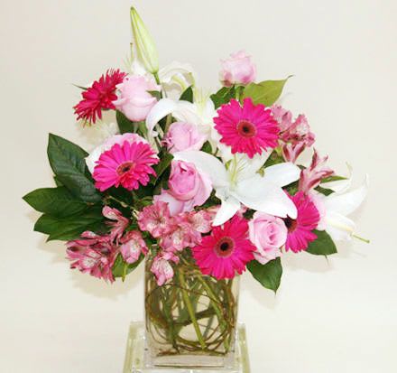 PEPPERMINT - Beautiful combination of roses, gerbera daisies, lilies and alstormeria in pinks and whites.