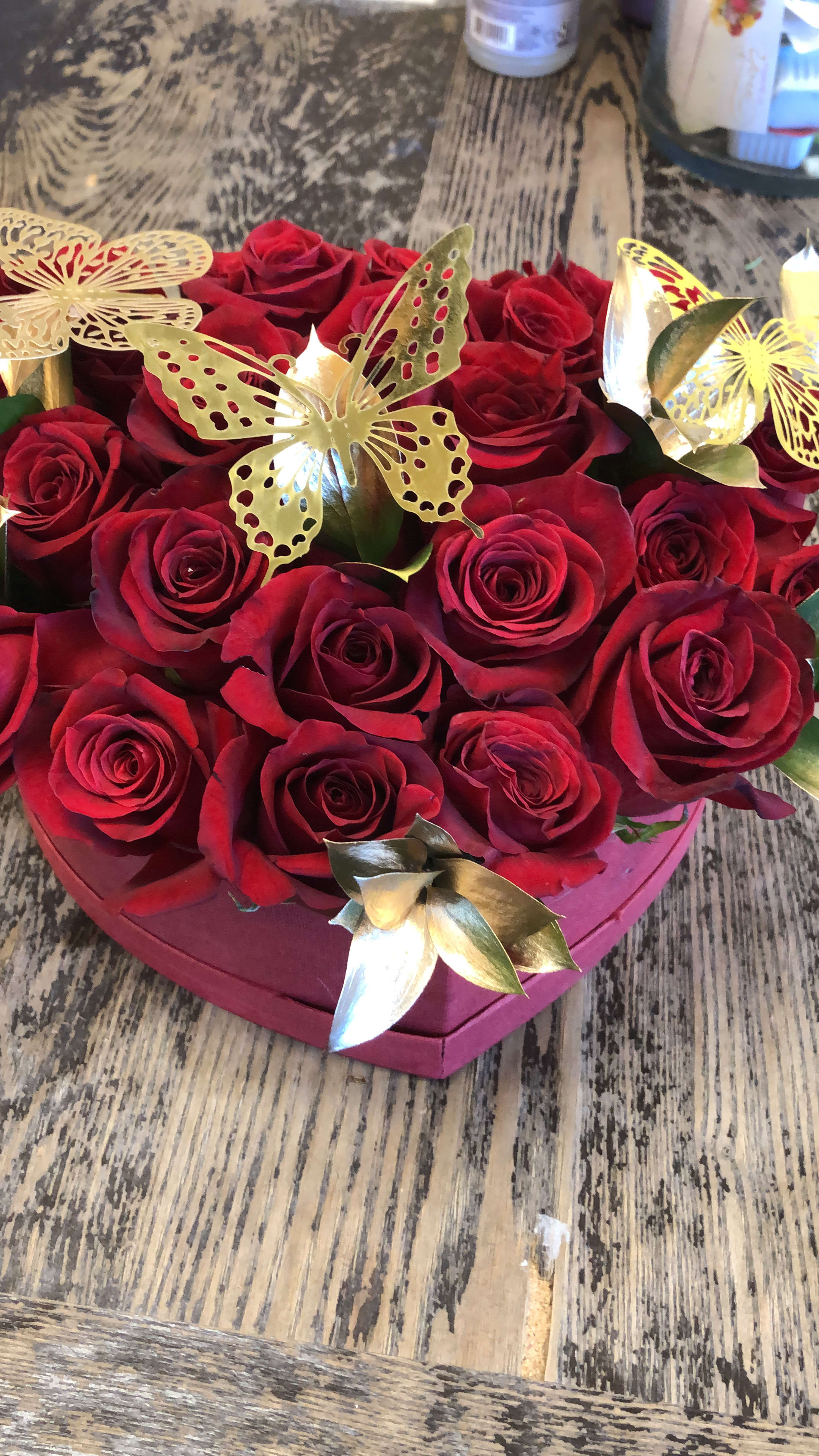 BE MY VALENTINE BE MY VALENTINE - 20 ROSES IN A HEART BOX ARRANGED WITH GOLD RUSCUS LEAVES AND GOLD BUTTERFLIES FOR DECOR