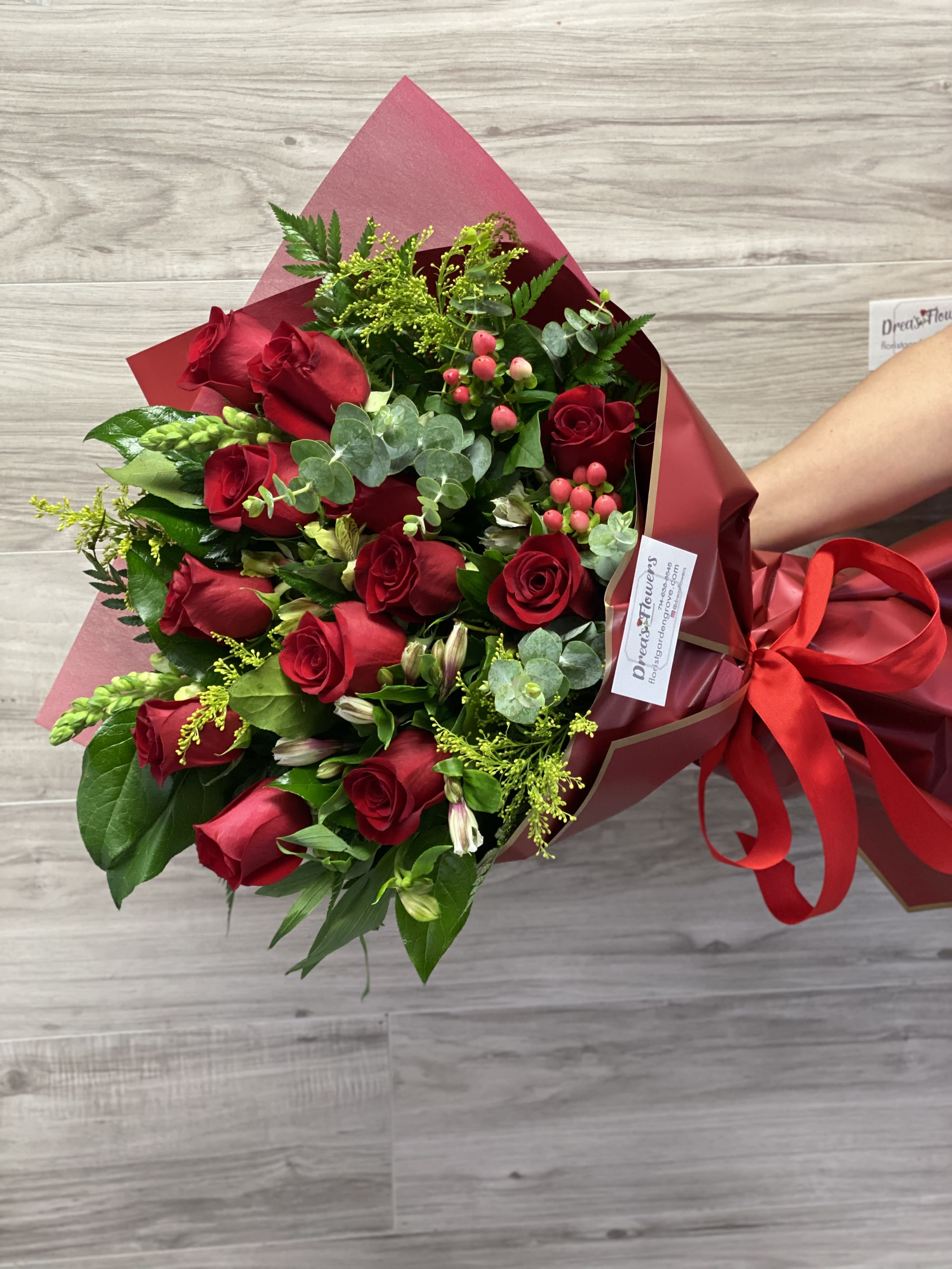 Just For You  - Our just for you red rose bouquet mix. Handheld bouquet , you may request certain color wrap, no vase included. Call to request vase if needed. 
