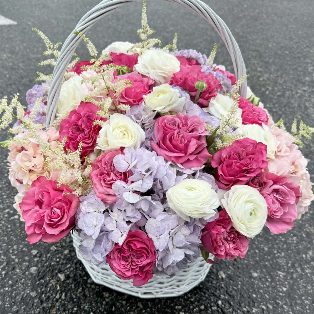 Elegant Bloom Basket  - Immerse yourself in the elegance of this exquisite flower basket, artfully arranged with vibrant pink and white roses, lush hydrangeas, delicate ranunculus, and graceful lisianthus. Perfectly designed for celebrations, anniversaries, or as a thoughtful gift, this luxurious arrangement embodies timeless beauty and sophistication. Handcrafted with premium flowers, it’s the ideal choice for making any moment unforgettable. Offering next-day flower delivery across Los Angeles, this designer basket is sure to leave a lasting impression. Order now to send a stunning expression of love and appreciation!