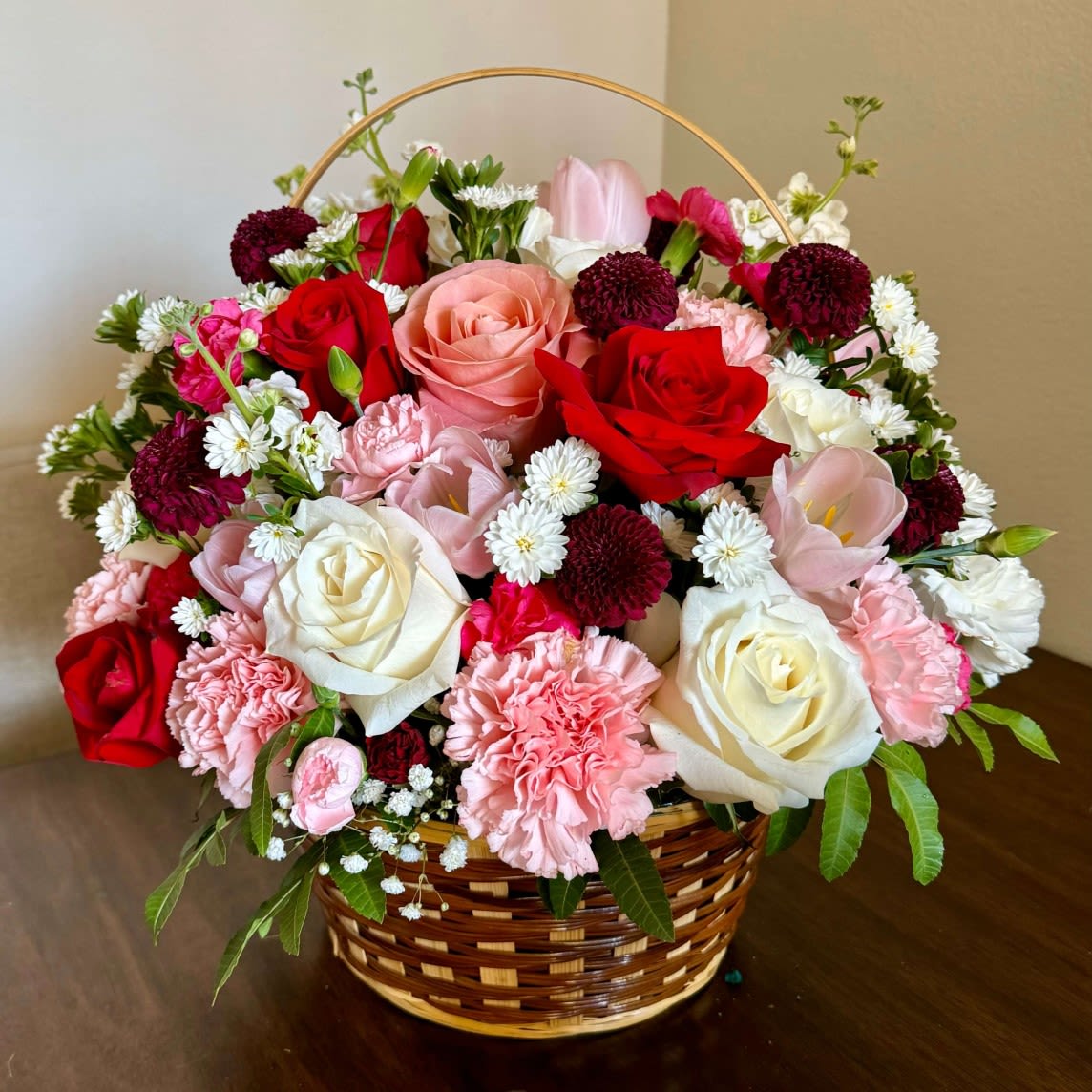 Flowers &quot;Eternal Elegance Basket&quot; - Flowers &quot;Eternal Elegance Basket&quot; Experience timeless beauty with our &quot;Eternal Elegance basket .&quot; This enchanting arrangement features exquisite roses, delicate chrysanthemums, and charming carnations, all artfully presented in a stylish bouquet. Perfect for any occasion, this bouquet radiates love and sophistication, making it a heartfelt gift for your loved ones or a stunning centerpiece for your home. Celebrate life's special moments with a touch of elegance! Flower delivery available