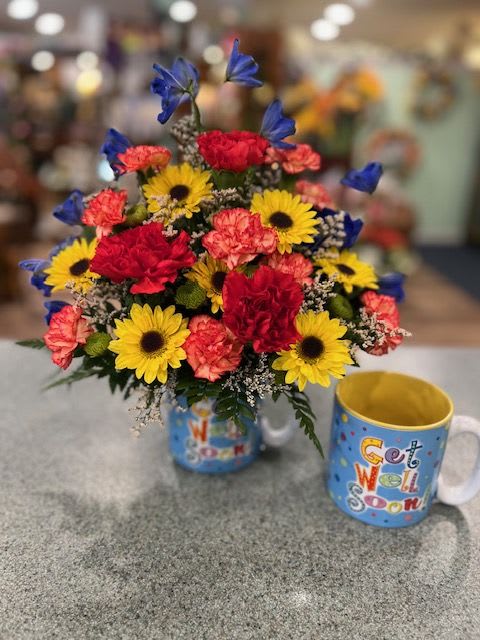 Get Well Mug (GWM) - Send a little pick me up with our mug of bright colored flowers!  Sure to pick up their spirits!
