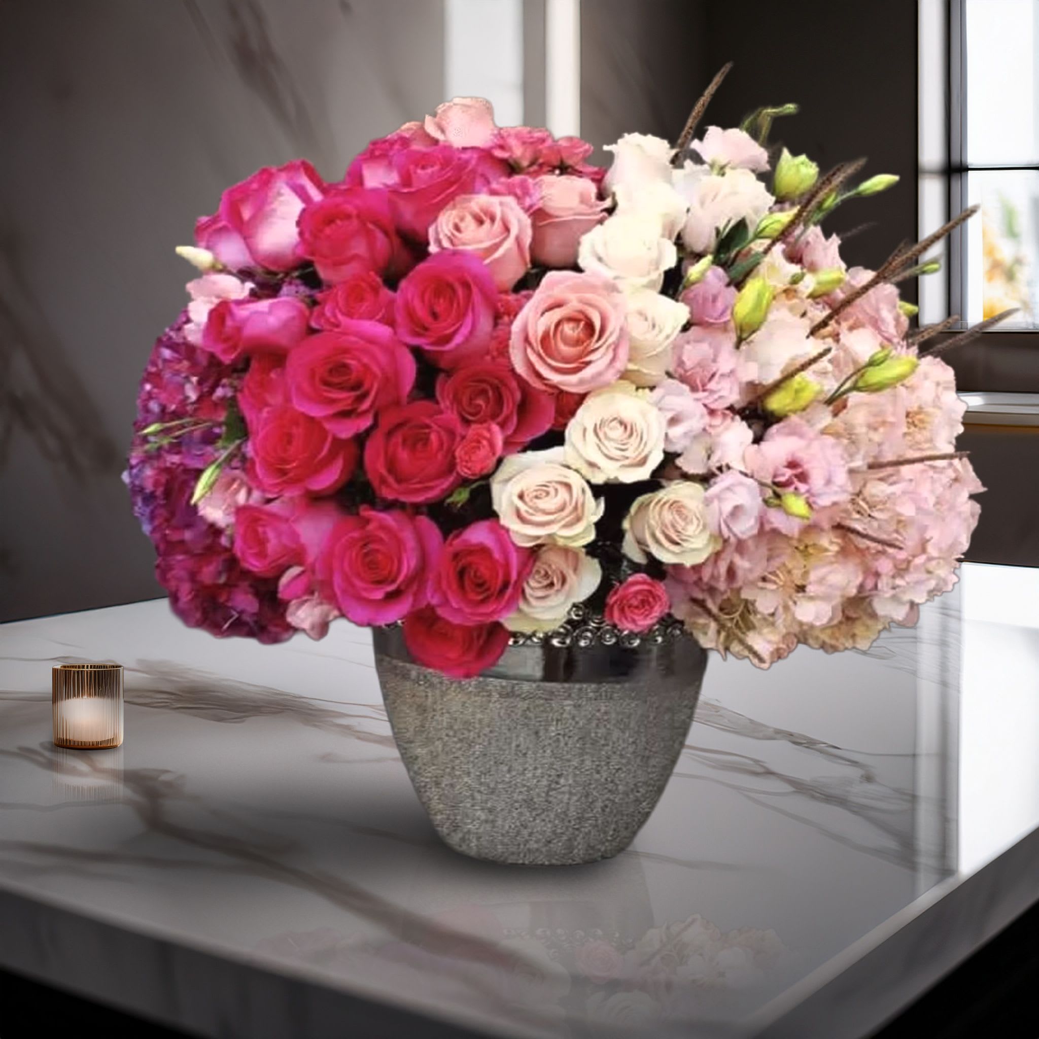 Pink Pave Hombre Pink Pave Hombre - A lavish, dome-shaped bouquet composed of fuchsia roses, hot pink spray roses, blush roses, ivory lisianthus, light pink hydrangea, and soft accent blooms, all presented in a textured silver metallic vase. This full-bodied composition showcases an elegant gradient from bold to soft pinks, making it both romantic and visually captivating. Perfect for birthdays, romantic gestures, luxury gifts, or event centerpieces, this arrangement offers premium blooms and a couture aesthetic that commands attention in any setting. Available for same-day delivery across Los Angeles, including Beverly Hills, West Hollywood, Century City, and Pacific Palisades.