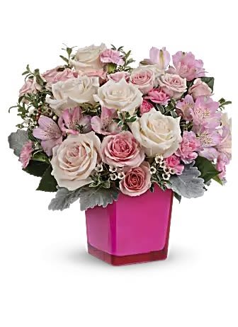 Teleflora's Be The Moment Bouquet - Make any moment magical with this breathtaking bevy of roses, presented to perfection in a hot pink glass cube that lives on as a cute candleholder.