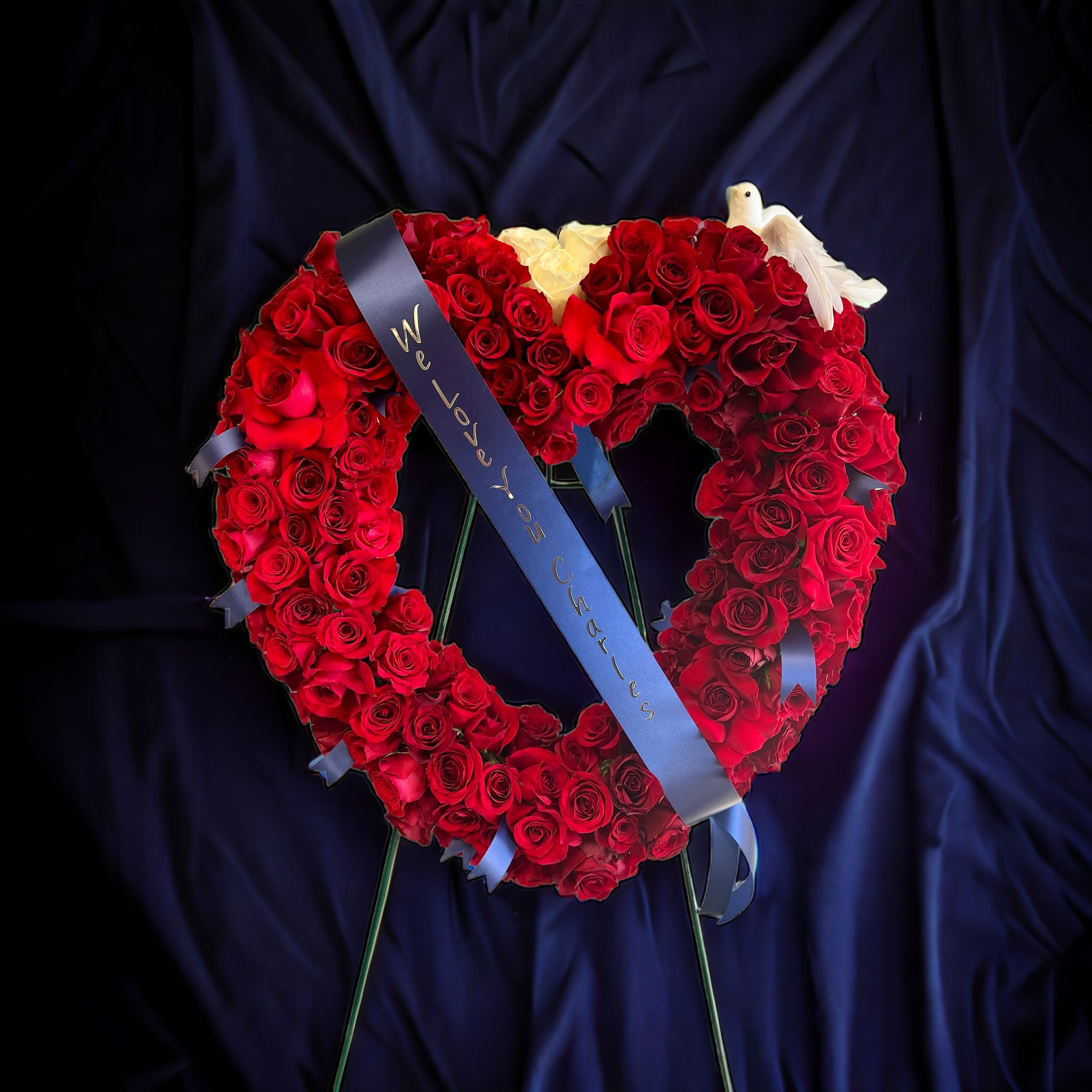 Everlasting Peace - 24 inch open heart with red roses, white dove, three white roses and ribbon