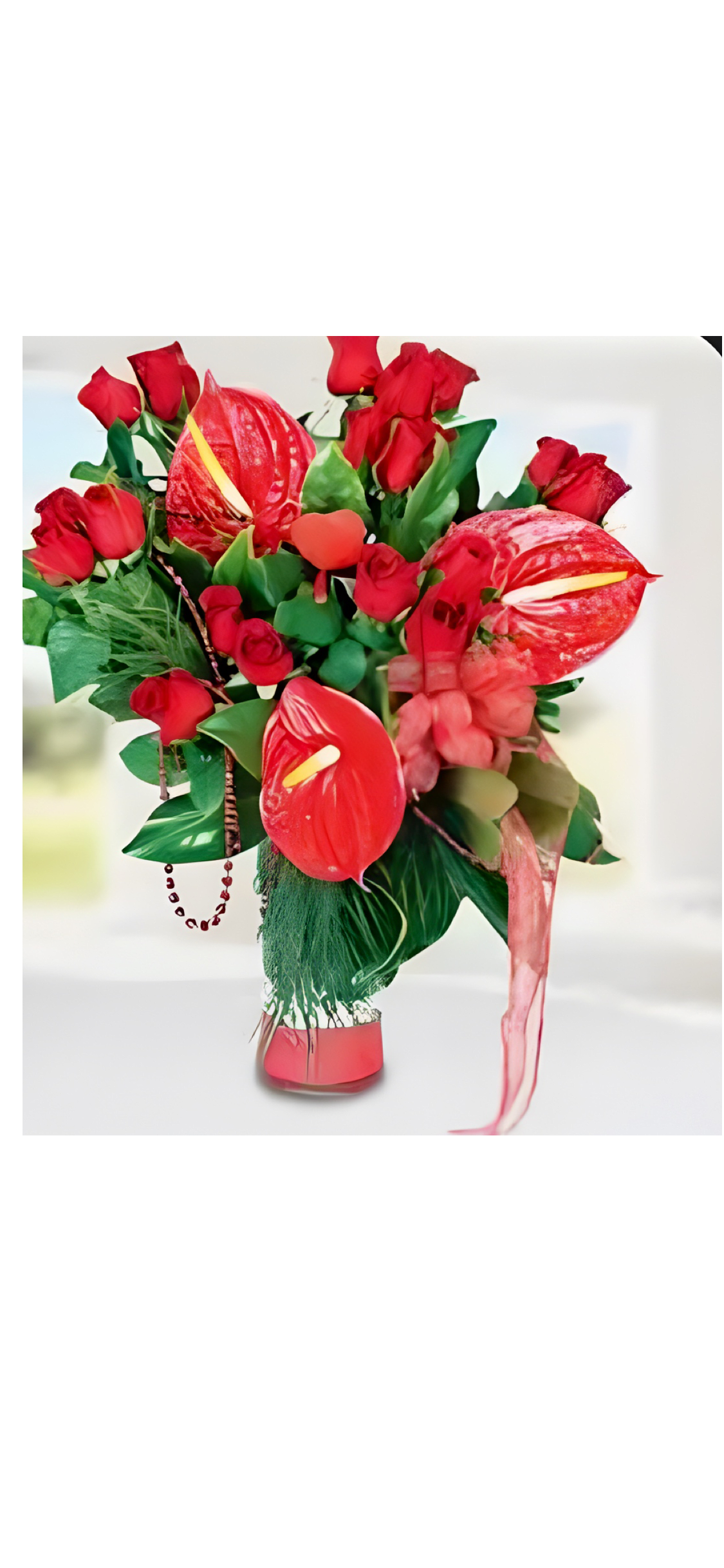 Aloha Love  - Aloha Love in a vase , Express your love with a touch of paradise. This bundle includes a stunning arrangement of tropical-inspired roses, whispering &quot;I love you&quot; in a unique way;  Upgrade to deluxe or premium add a  a box of exotic Hawaiian chocolates, promising a moment of shared bliss; and a lovable teddy bear, a constant companion and a tangible hug when you can't be there.  Premium includes upgraded roses 