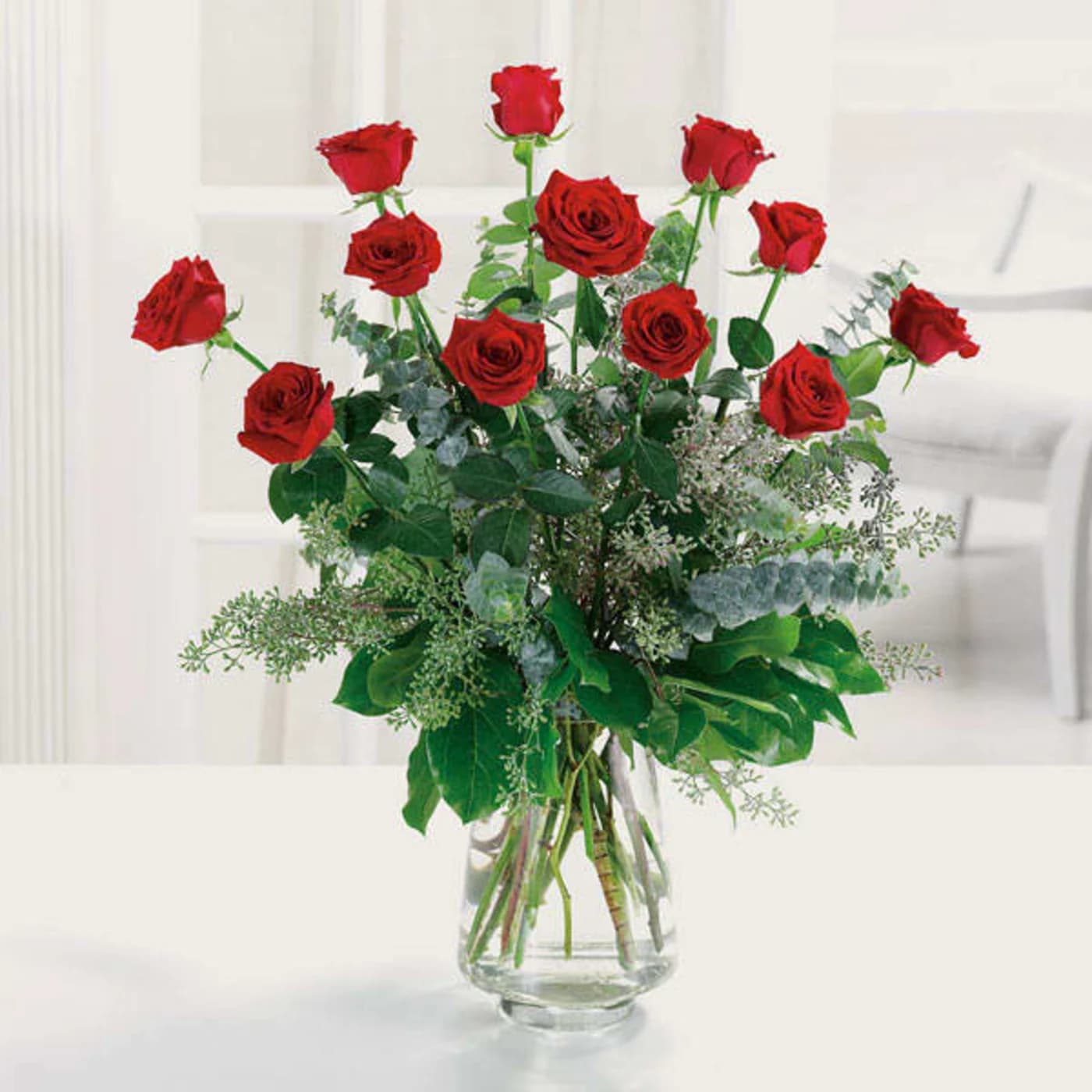 The Perfect Dozen Red Roses The Perfect Dozen Red Roses - A dozen red roses are always perfect, always savored. We add even more charming beauty with spiral eucalyptus and salal.