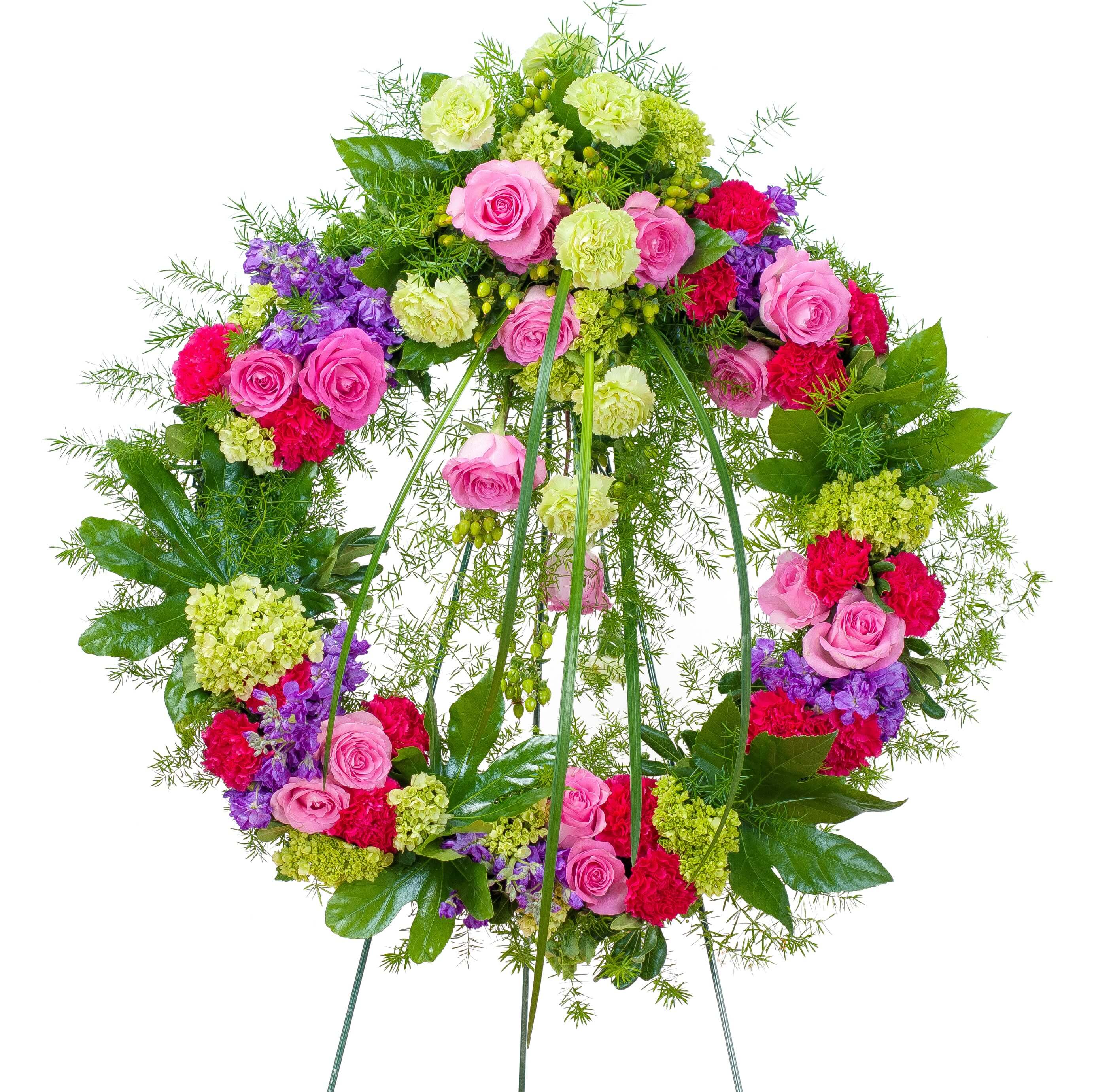 Forever Cherished Wreath Forever Cherished Wreath - This beautiful wreath with a combination of pink and purple flowers will show that they will be forever cherished.