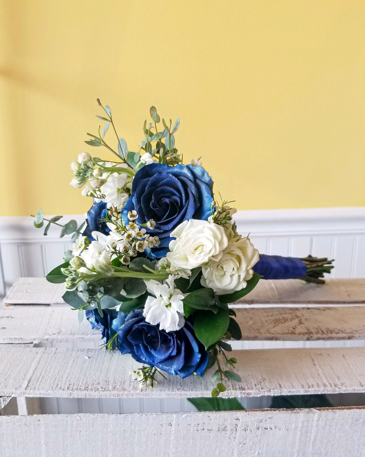 Dark Blue &amp; White Mixed flowers Handheld Bouquet - Handheld white and dark blue prom bouquet with mixed flowers. Actual Bouquets will vary with particular blooms so that they have their own individual signature. Picture is for example. *** If you would like to change any colors, please note in the Florist Instructions at checkout. We will contact you to confirm availability and pick up time *** ***All Prom orders are final - No changes or cancellations within 48 hours of event ***