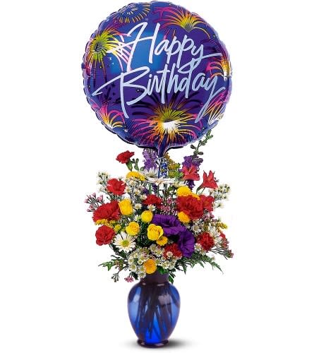 Birthday Fireworks Birthday Fireworks - Carnations, chrysanthemums and larkspur arrive in a blue glass vase with attached "Happy Birthday" message balloon. Approximately 15" W x 19.5" H