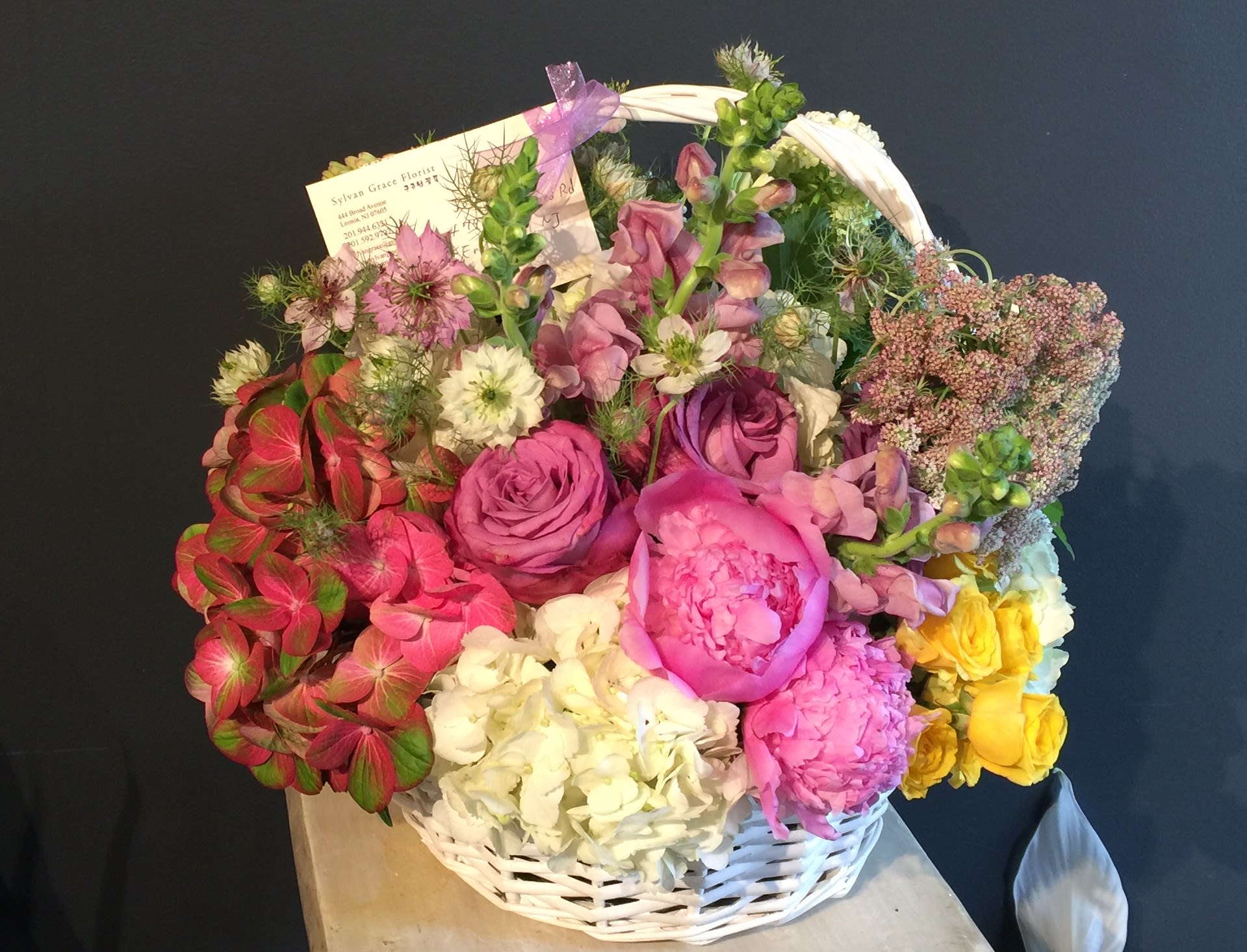 SG - 38 - This LARGE SIZE arrangement which will be arranged in a basket. If you like this arrangement style but prefer with different colors of flowers(ex - pastel) please leave a note in the florist instruction when you check out.  *** For Valentine's Day, peonies will be substitute with David Austin garden roses which are most luxurious flowers out there. *substitution - In this event, we will substitute with a second choice of similar flowers and container of equal value and beauty. Every effort will be made to maintain size, shape, and overall color schemes of an arrangement.