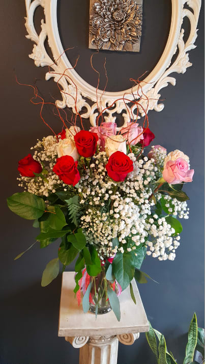 SG-16 - &quot;WOW! Is that mine?&quot; is our customers' favorite line when they see our one dozen roses. This one will be more beautiful since this is the upgrade version of it. About 27&quot; Tall and 20&quot; Wde.(About 31&quot; Tall with Branches) Definitely grand and tall size with 70cm premium red roses which is hand selected by top growers.  2 Options; 1) All Red 2) Red &amp; Pink 3) If you are looking for a certain color, please leave a note for our florists.  Due to various seasonal and regional conditions, and the variety of unplanned issues courtesy of Mother Nature, availability of some flowers may be very limited in certain areas.  In this event, we will substitute with a second choice of similar flowers and container of equal value and beauty. Every effort will be made to maintain size, shape, and overall color schemes of an arrangement. Our goal is your complete satisfaction, rest assured that every effort will be made to provide an arrangement of equal or greater value. 