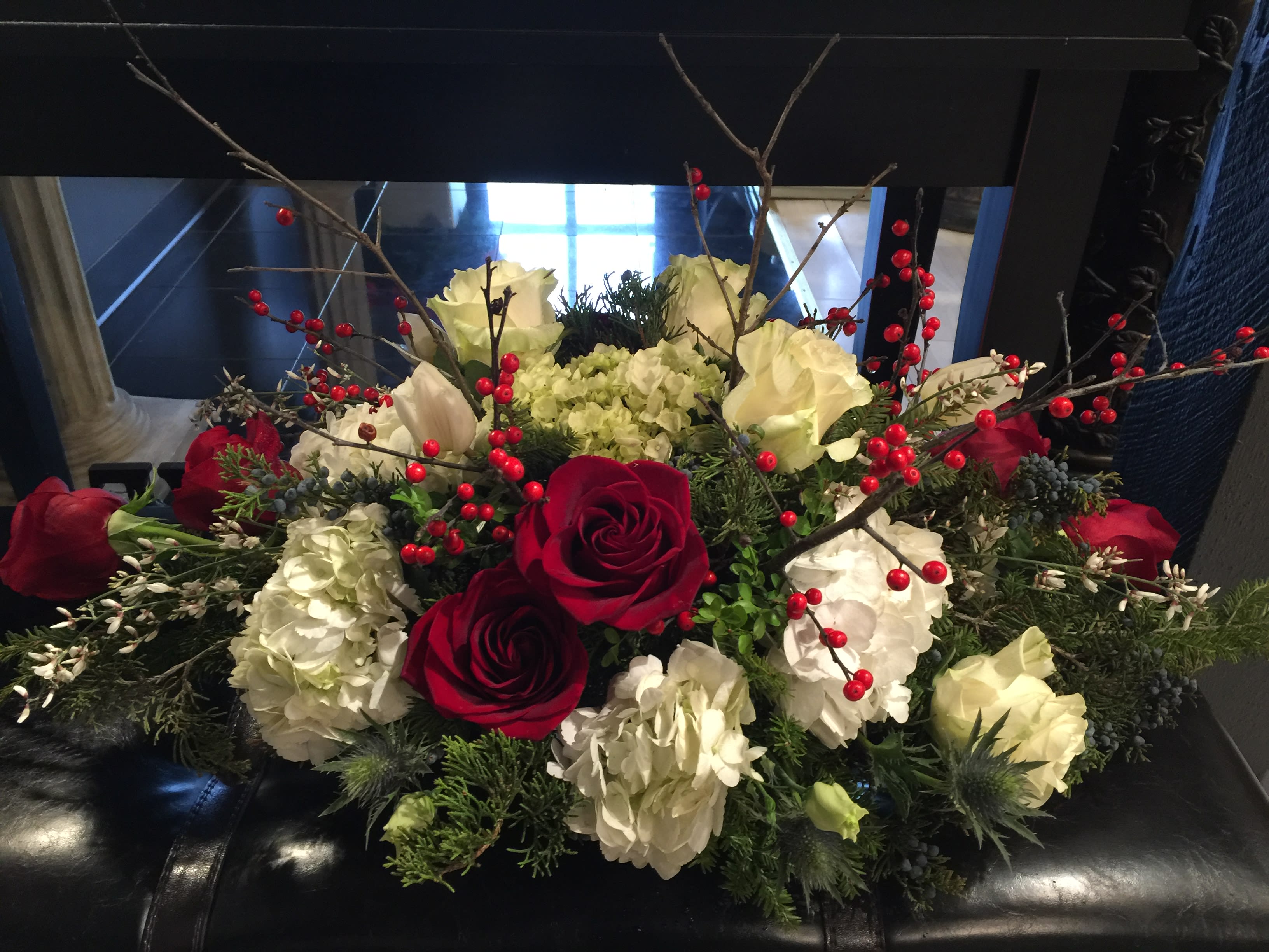 Happy Holidays - Centerpiece - This is a beautiful centerpiece for holidays. If there's any request such as different color flowers- just leave a note in the florist instruction. *substitution - In this event, we will substitute with a second choice of similar flowers and container of equal value and beauty. Every effort will be made to maintain size, shape, and overall color schemes of an arrangement.