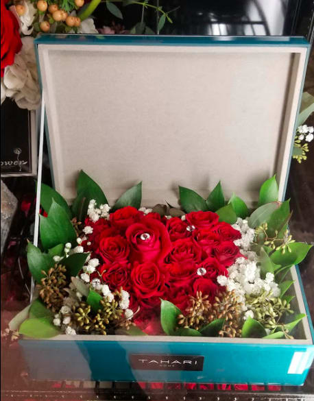 Only One - This arrangement is arranged in a box that after enjoying the flowers, she can use the container for other purpose. 
