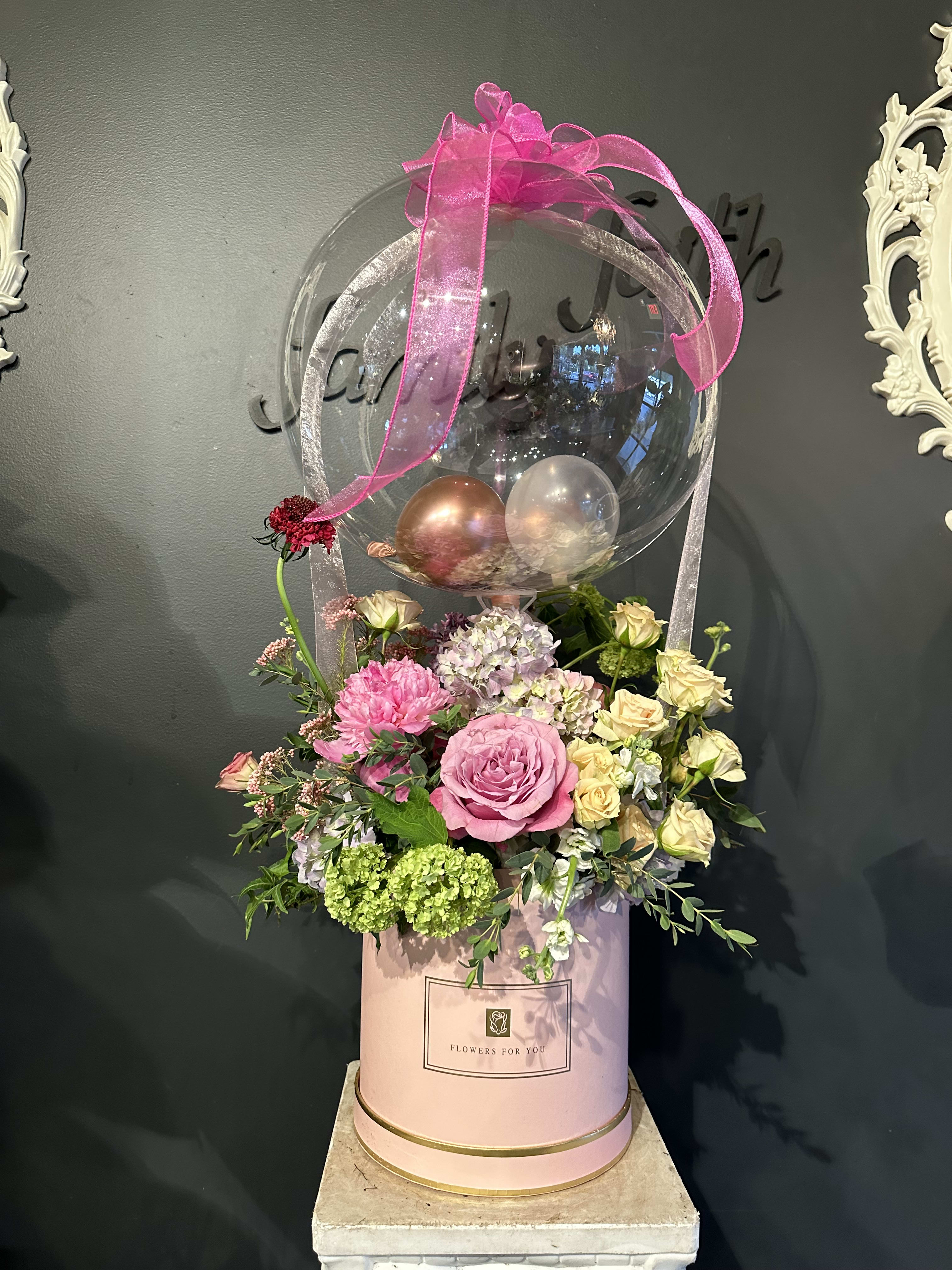 UP - Beautiful mixed flower arrangement in a modern box.   This arrangement is approximately 30 inches tall, and will definitely blow away your loved one’s mind. :)  (Please note that colors of boxes may change. The color of balloons and ribbons will change to match with a box ) 