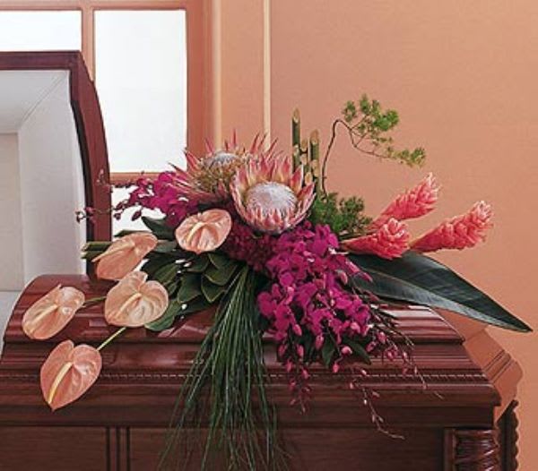 TF 213-1 Tropical Half Couch Spray - Tropical Casket spray with anthurium, ginger, king protea, dendrobium orchids, carnations, ming fern, bear grass and ti leaves