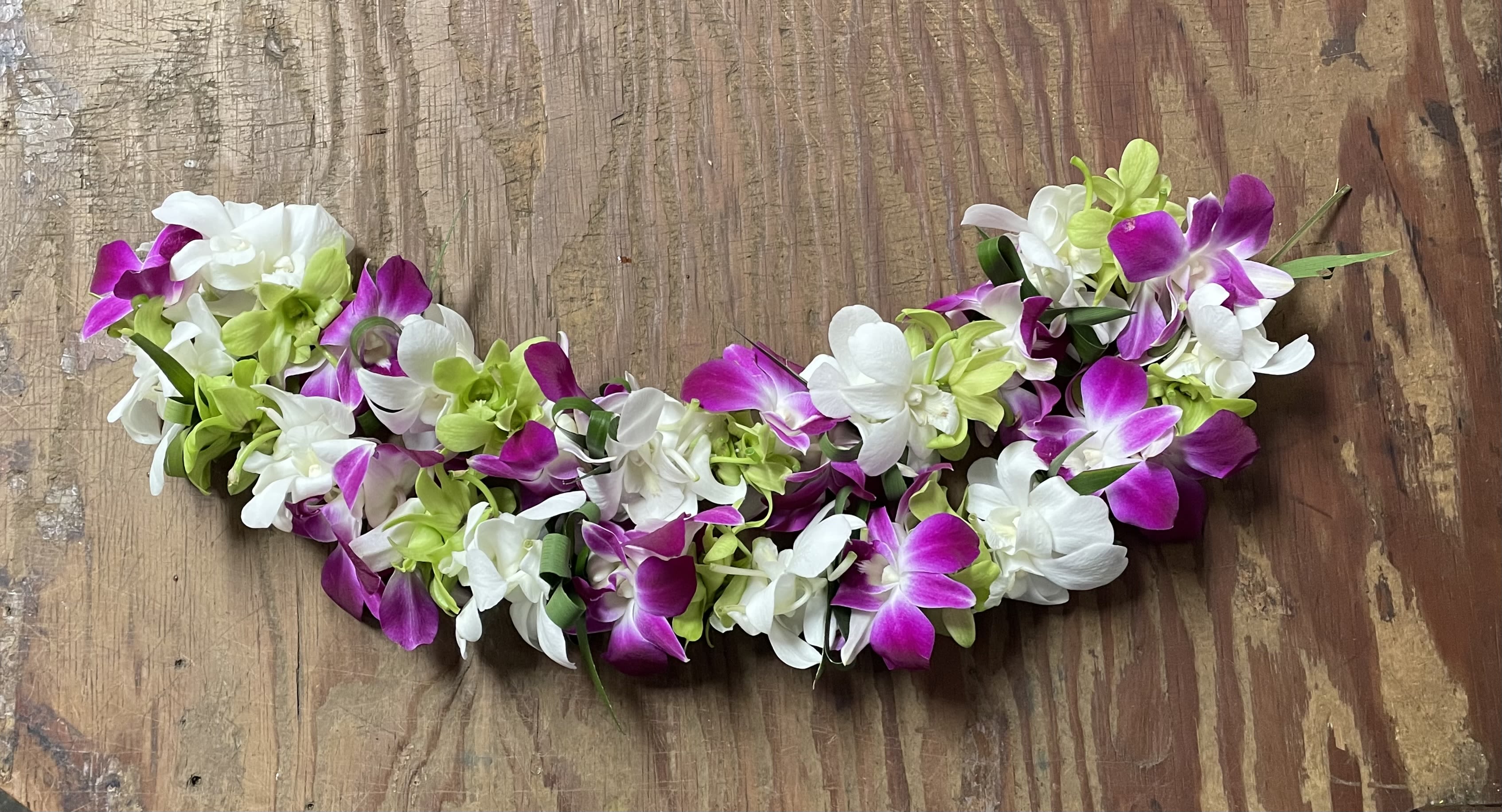Leis #36 Leis #36 - Our beautiful leis are great for graduations, birthdays, or any celebration!