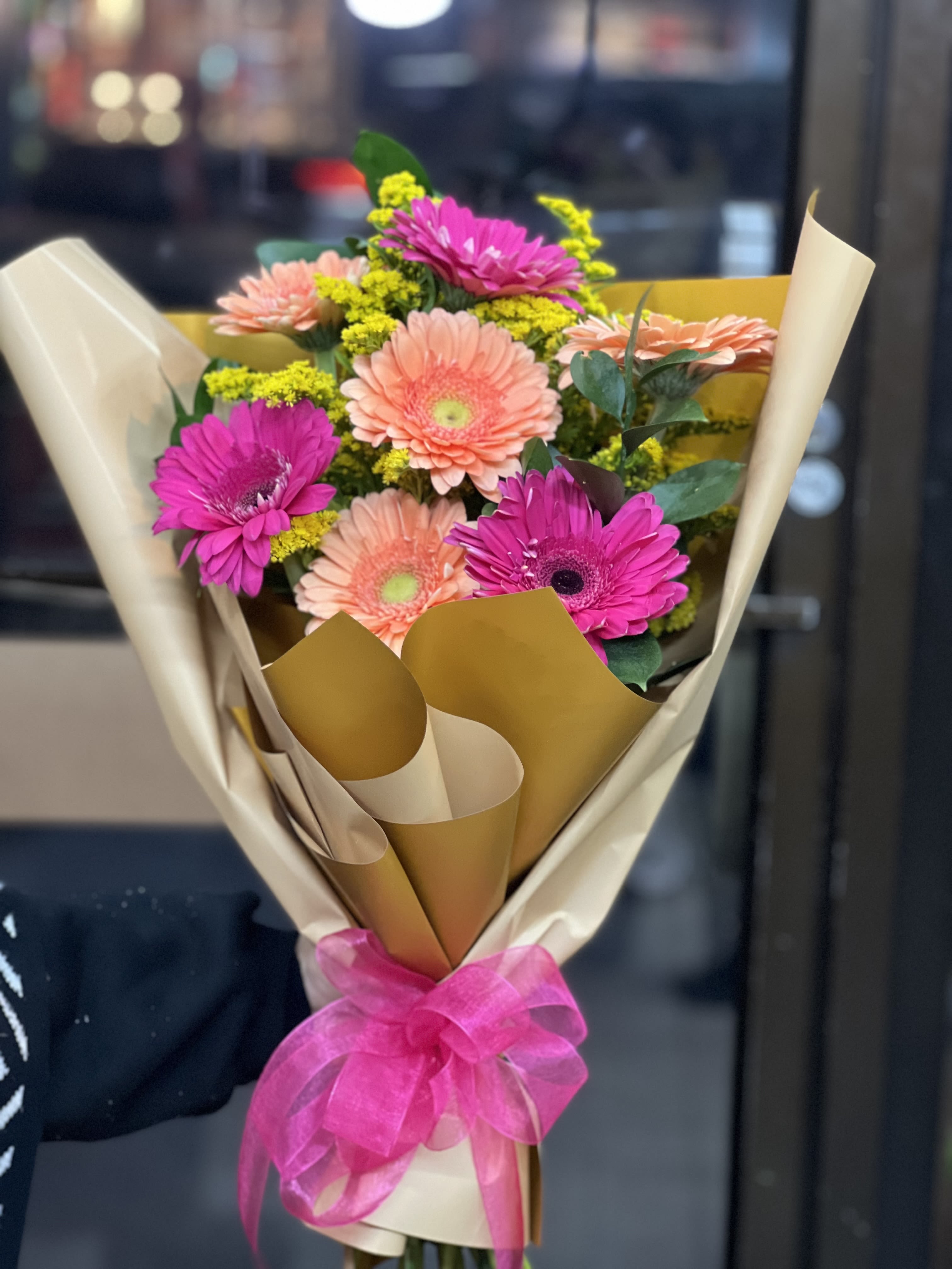 Gerbera paradise  - This beautiful one face loose bouquet of Gerbera daisies is the perfect bright and colorful gift for any occasion! ( colors can be customized) Please note: Vase not included. 