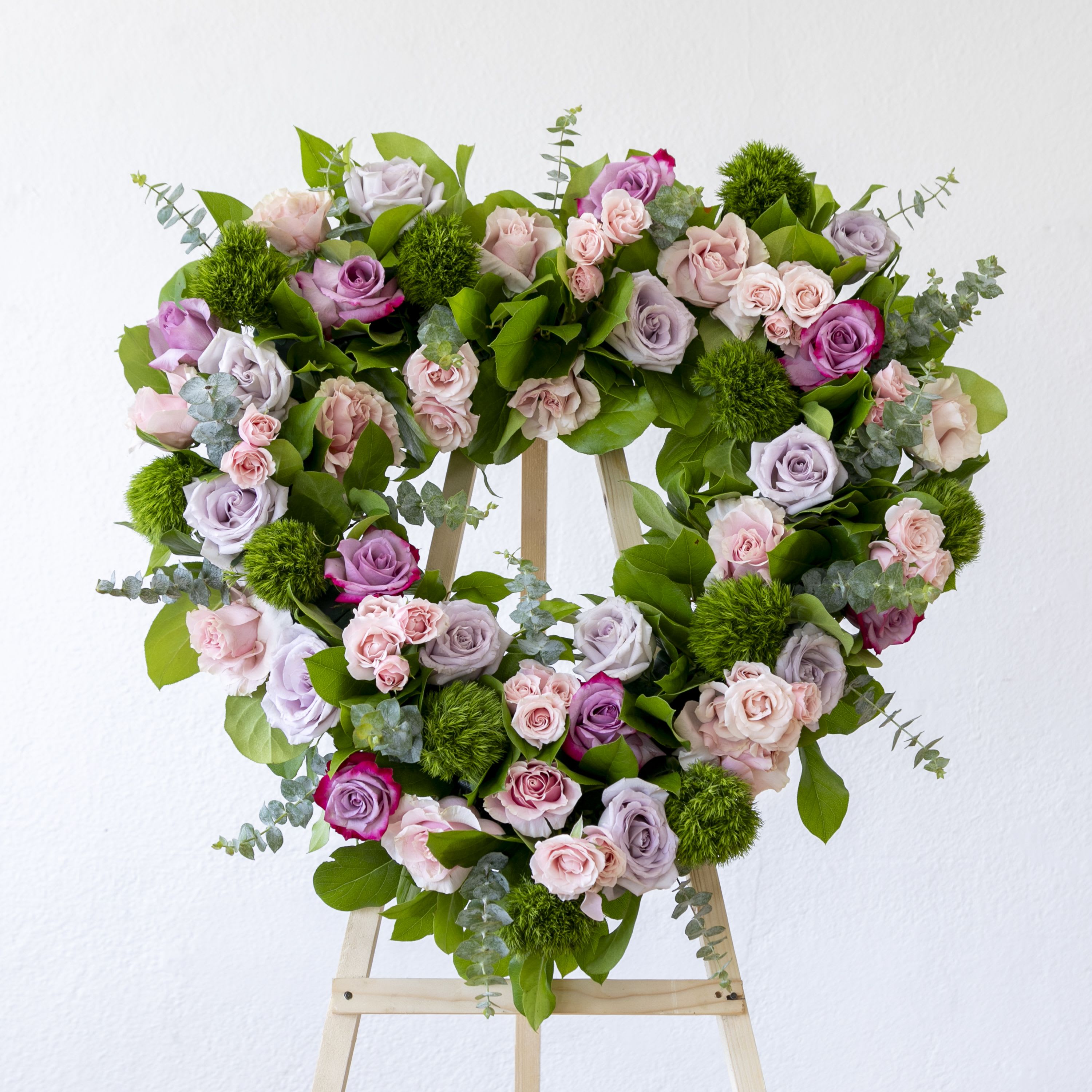 Open Heart Spray - Sympathy Funeral open heart easel Spray with lavender and light pink blooms, greens and fillers