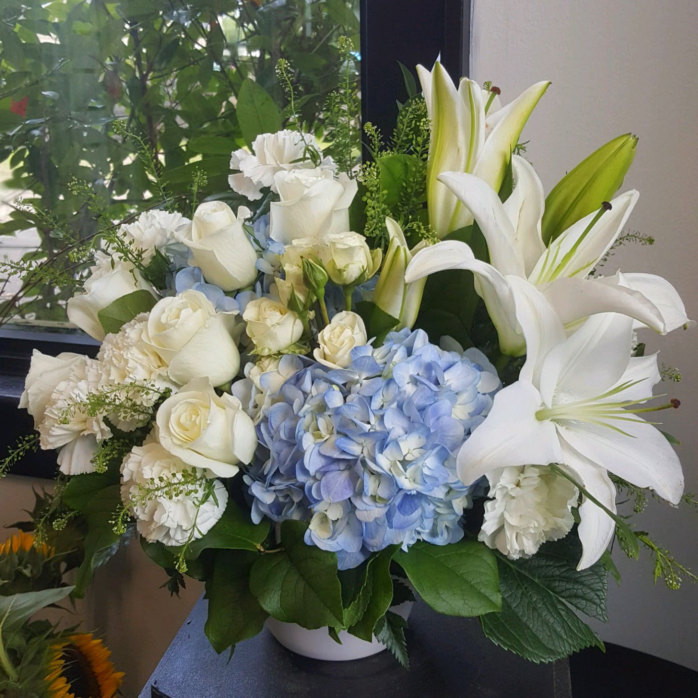 Beautiful Dreams - Soothing and respectful. Calm and compassionate. This beautiful collection of white and light colored blossoms will deliver your loving thoughts perfectly.  One-Sided Orientation  Approx. 15&quot; Tall  