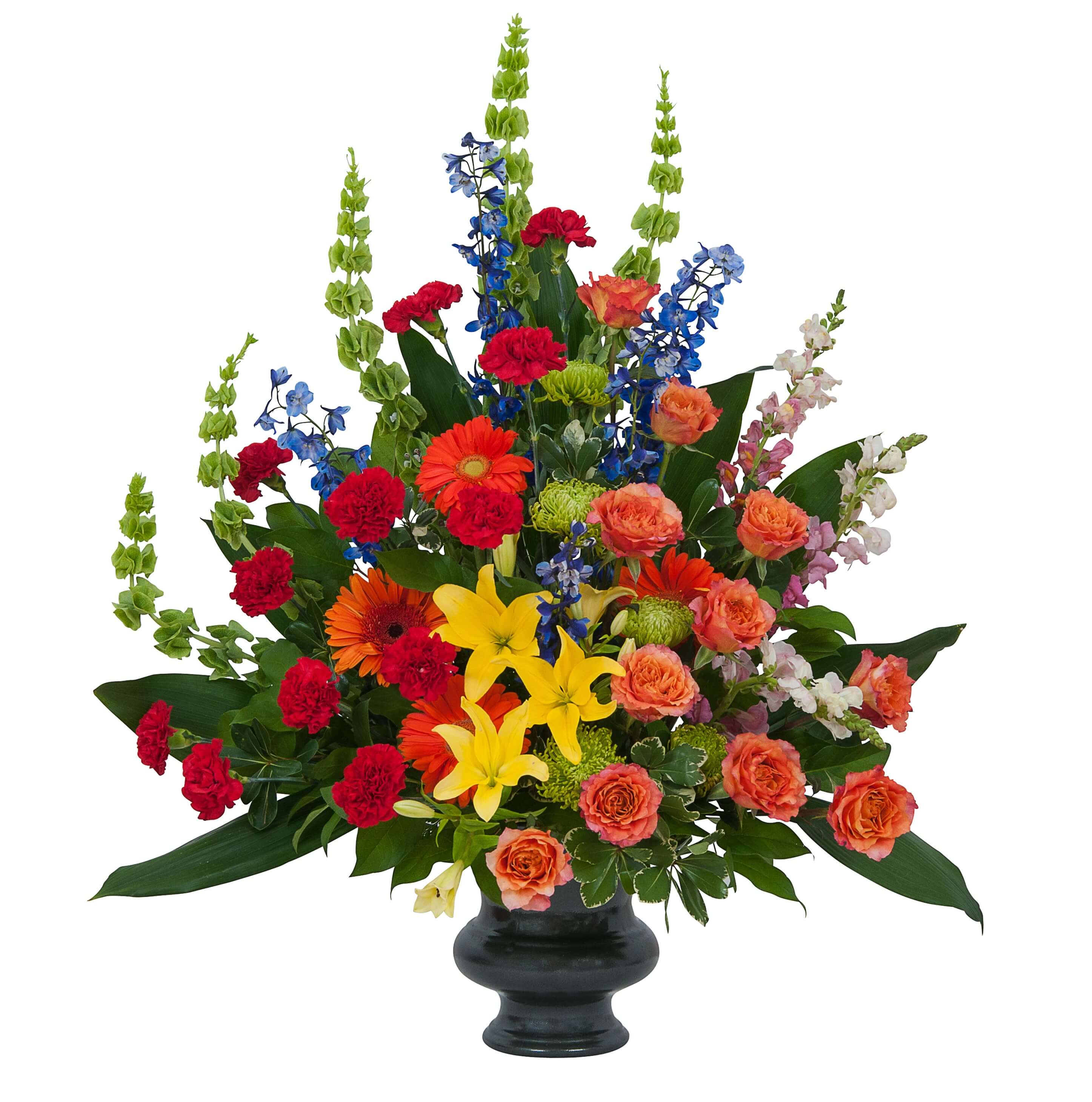 Treasured Celebrations Urn - A combination of bright color blooms to celebrate the life of your loved one.