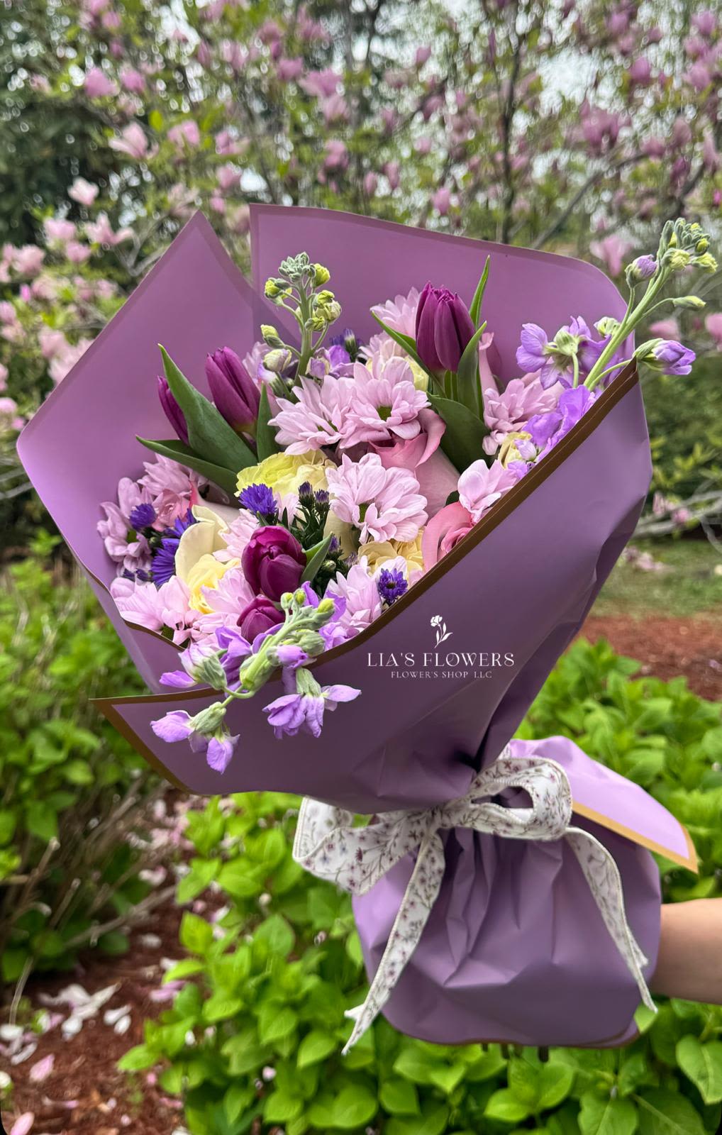 Moments of joy. - Celebrate Mom with a vibrant mix of tulips daisies,and seasonal blooms.
