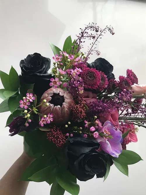 Black Magic XL &amp; XXL - Our deepest, richest floral colours come together around our exquisite, long lasting black roses in our Black Magic bouquet. This bouquet is available in the following sizes: Small $75,  Medium $100  Large $125  Extra-Large $185  XXL $235  The video is an XL version.  It can be purchased as a hand-tied bouquet or upgraded by adding our beautiful Destiny Urn + $35 small/medium + $60 Large/X-Large + $70 XXLarge 