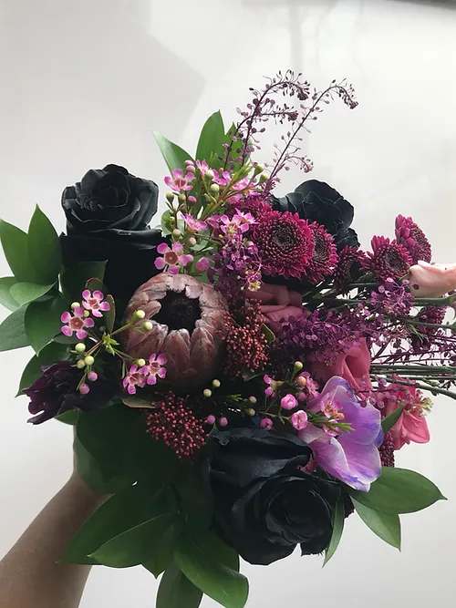 Custom Bouquet - Black Magic - Our deepest, richest floral colours come together around our exquisite, long lasting black roses in our Black Magic bouquet. This bouquet is available in the following sizes:  Small $75,  Medium $100  Large $125  Extra-Large $185  XXL $235   The video below shows XL version.  It can be purchased as a hand-tied bouquet or upgraded by adding our beautiful Destiny Urn + $35 small/medium + $60 Large/X-Large + $70 XXLarge
