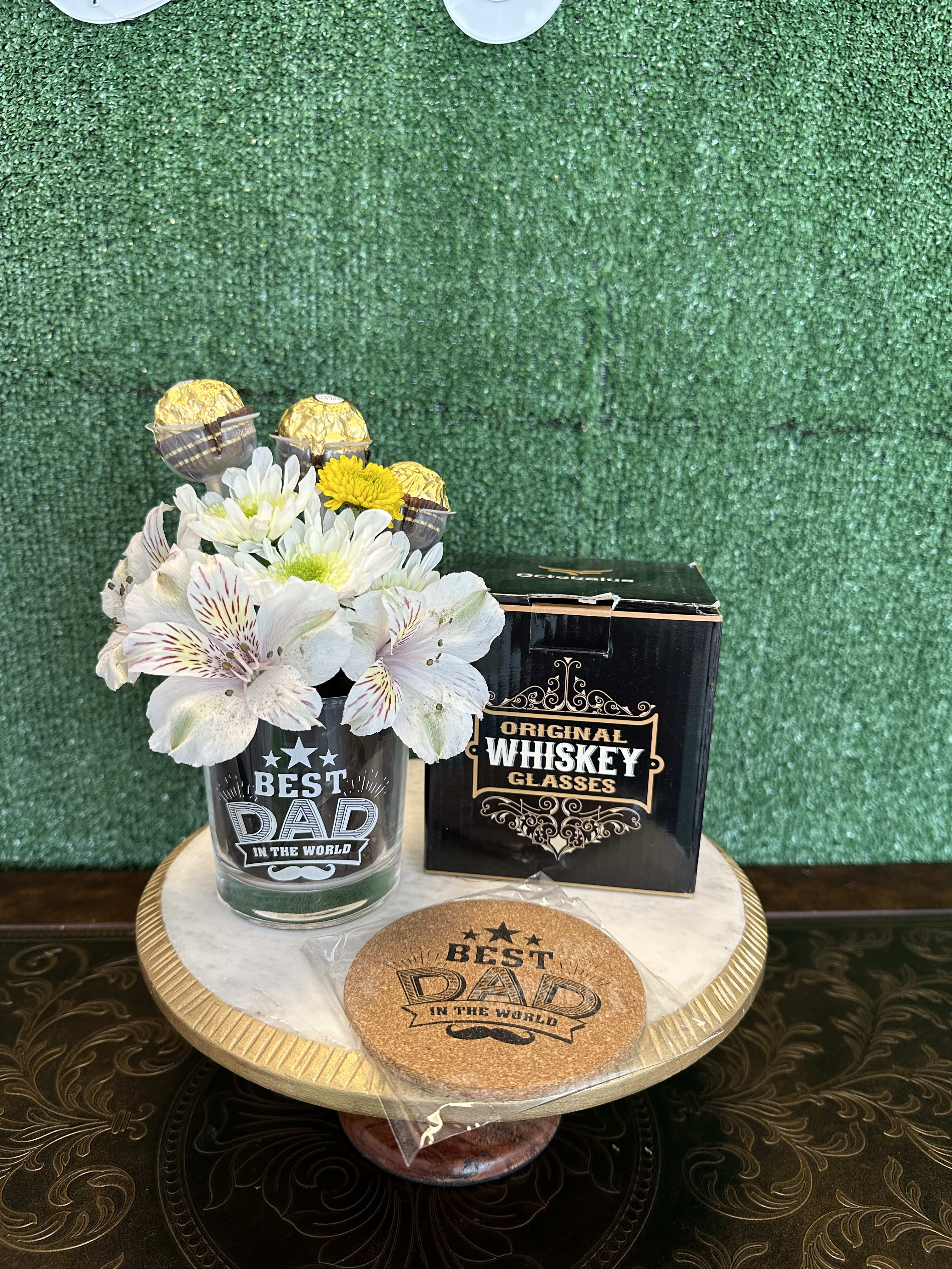 Whiskey bouquet - Clear whiskey glass with flowers and chocolates includes the box and coaster Flowers and color substitution might apply